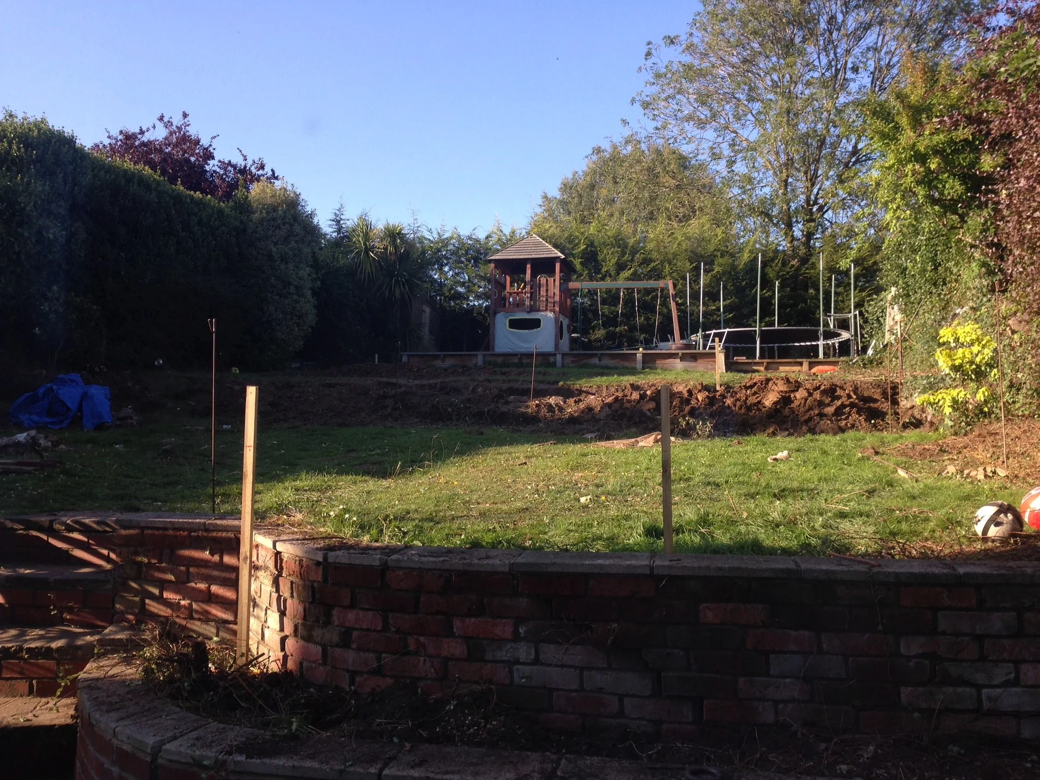 "The lawn was one long slope, so we asked the builders to introduce a second tier"
