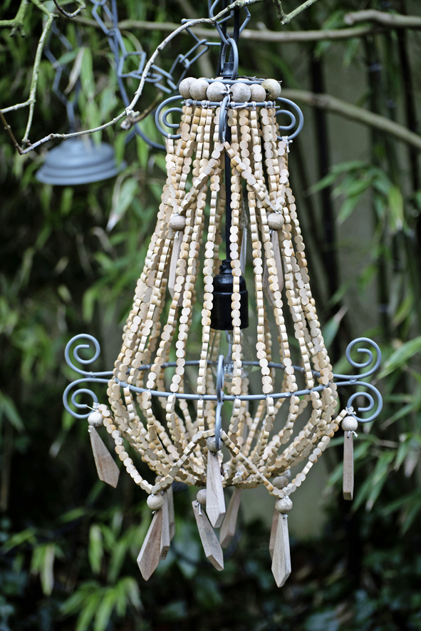 Treat the garden like an indoor room with carefully chosen accent pieces.