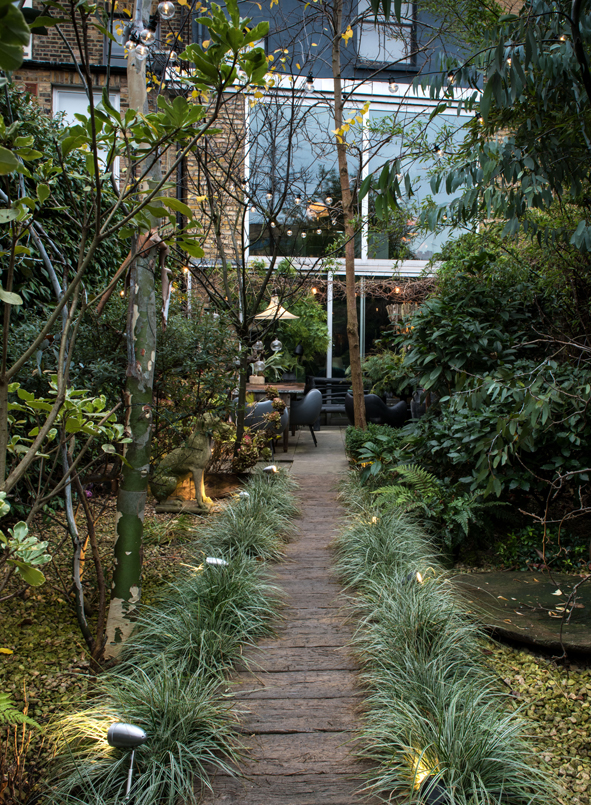 Urban Retreat: A small sheltered seating area has been sited outside the customised cabin.
