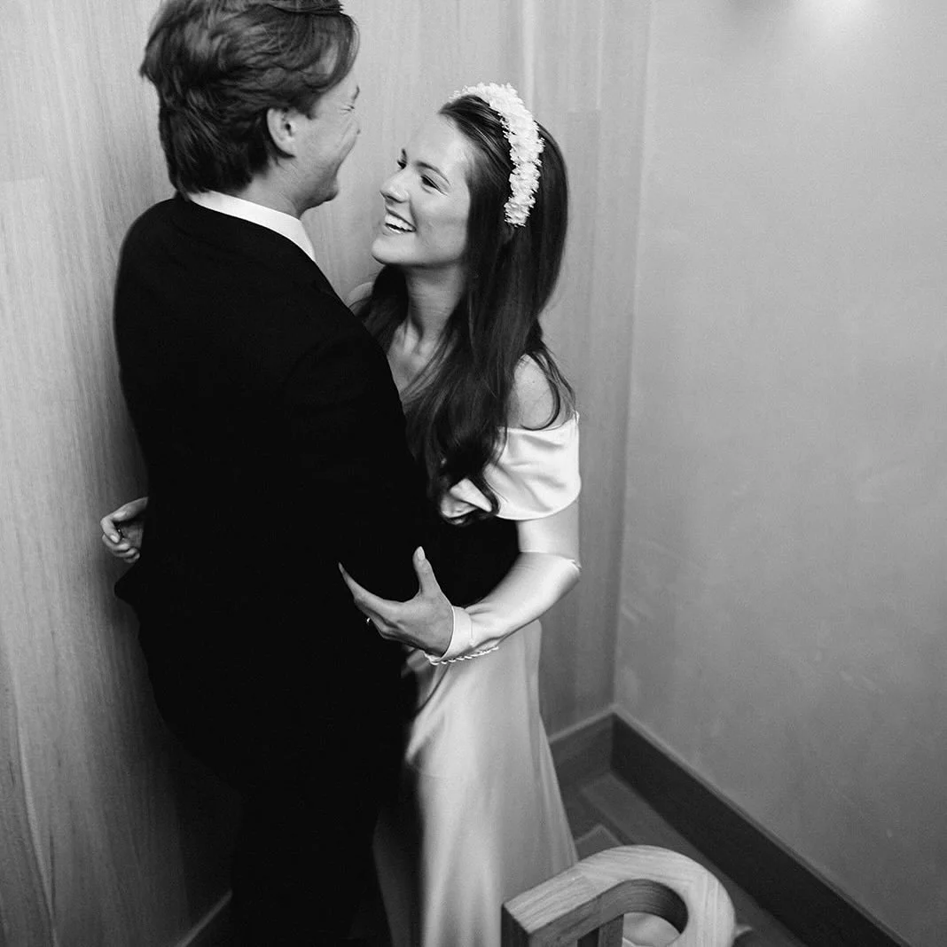 This sweetly captured first look was one of our favorites. There was something so genuine about her casually waiting at the top of the stairs&mdash;it felt real, like the way you&rsquo;d want to be seen by someone you love on such an important day. N