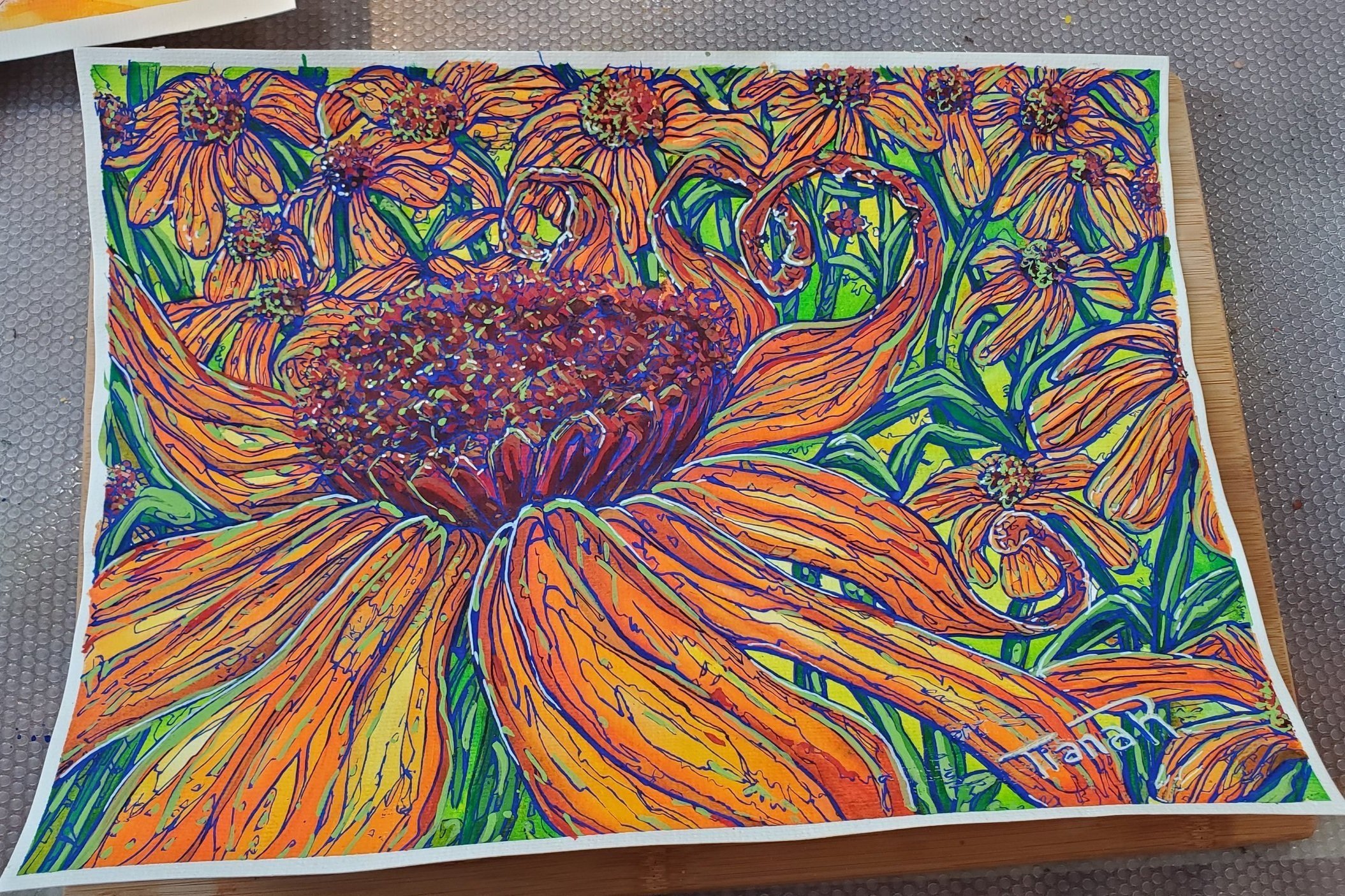   An image of Tiana Robinson’s painting. An elaborate painting of a large flower, petals spread open, in red, orange and blue. Behind the large flower are smaller flowers lining the background.  