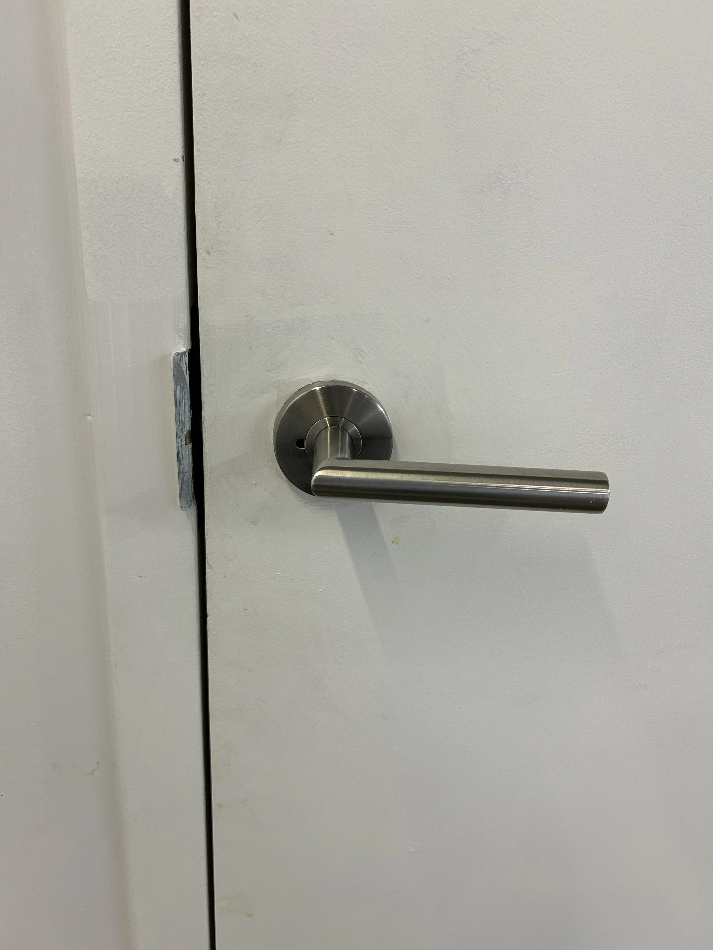 Washroom door handle