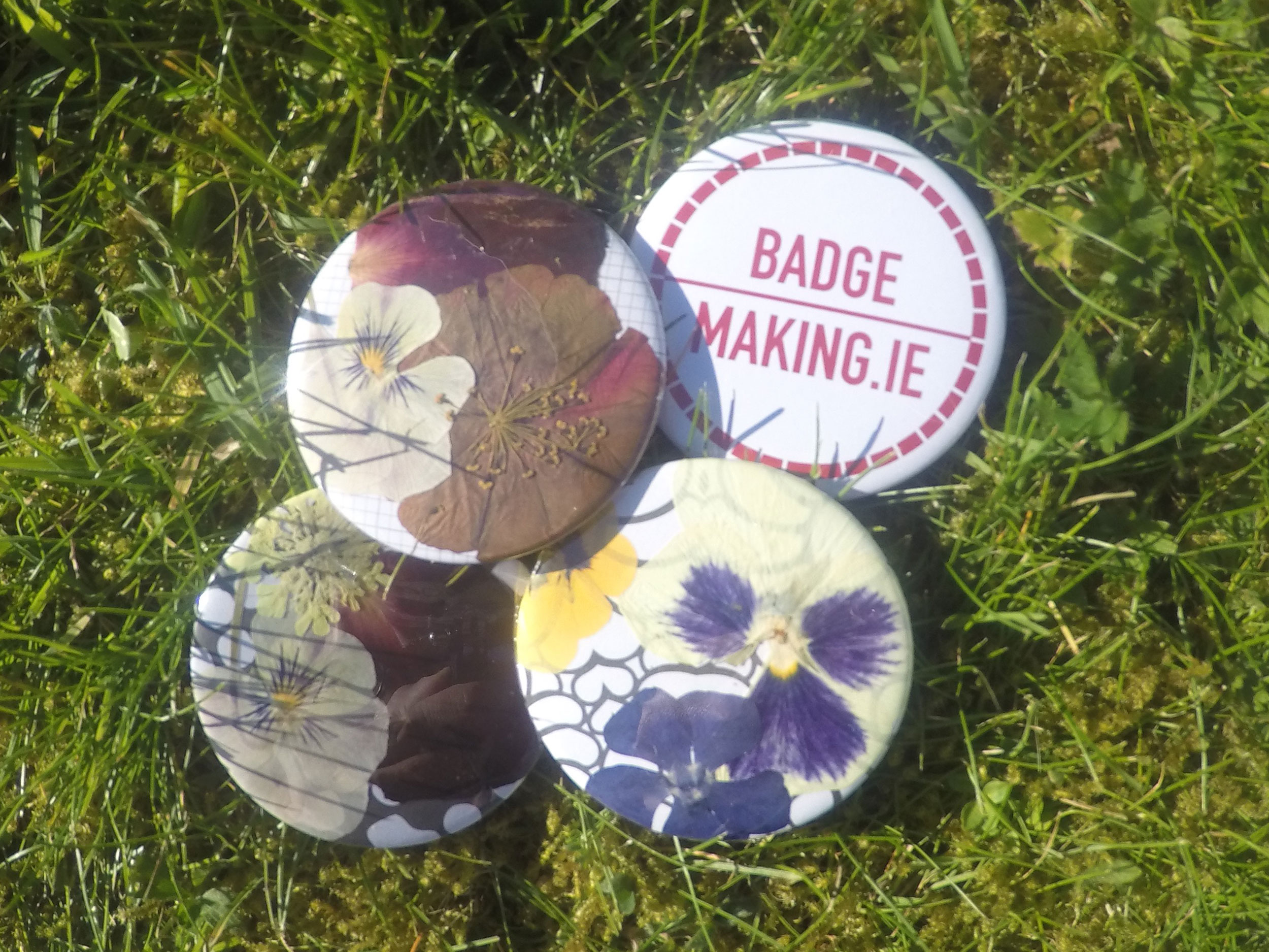 Badges made with pressed flowers