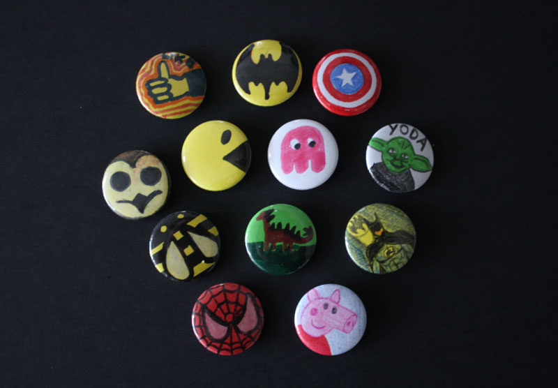Hand drawn badges from a corporate family event
