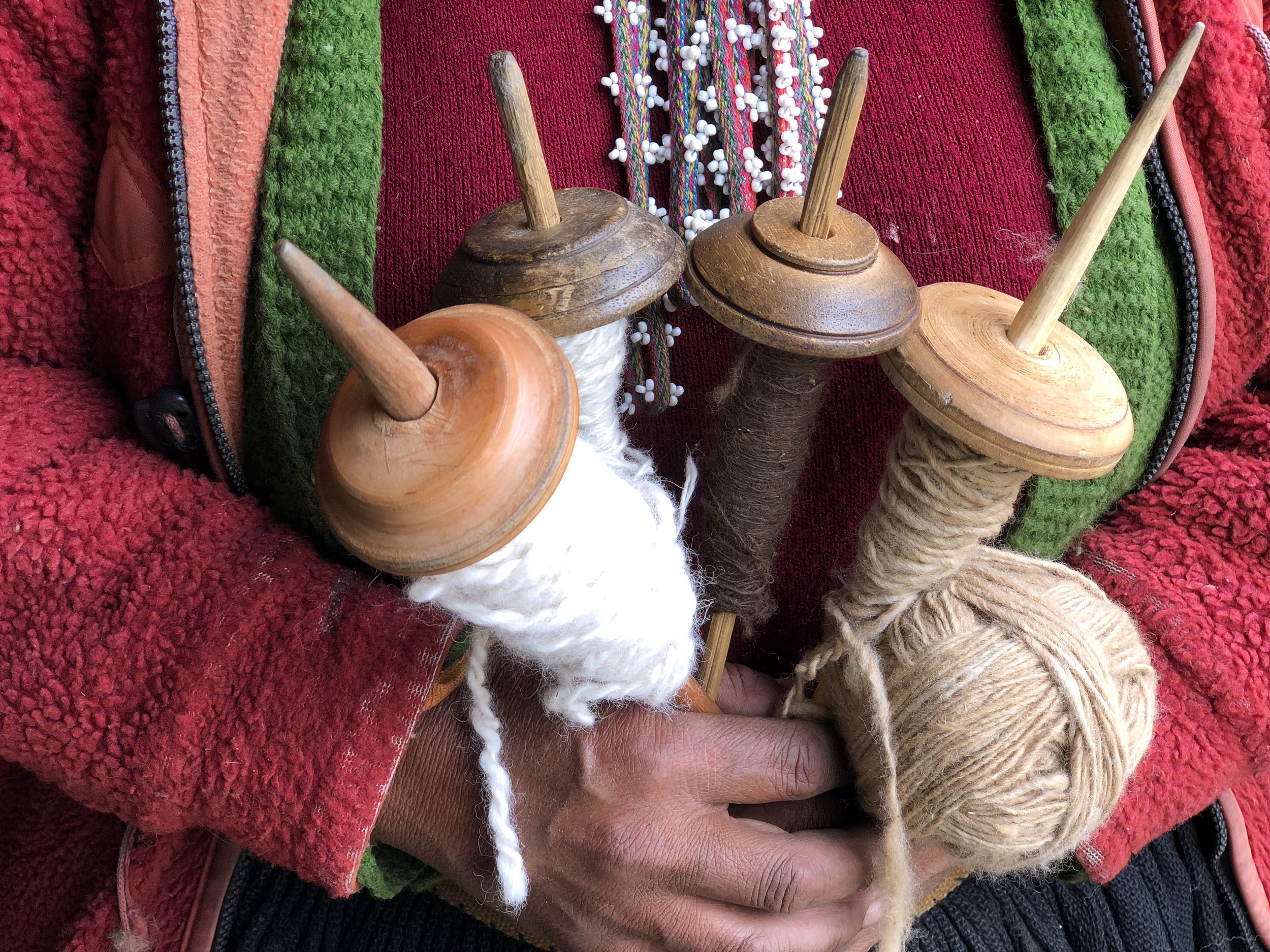 A tool called a puska, is used to spin the raw fiber into yarn.