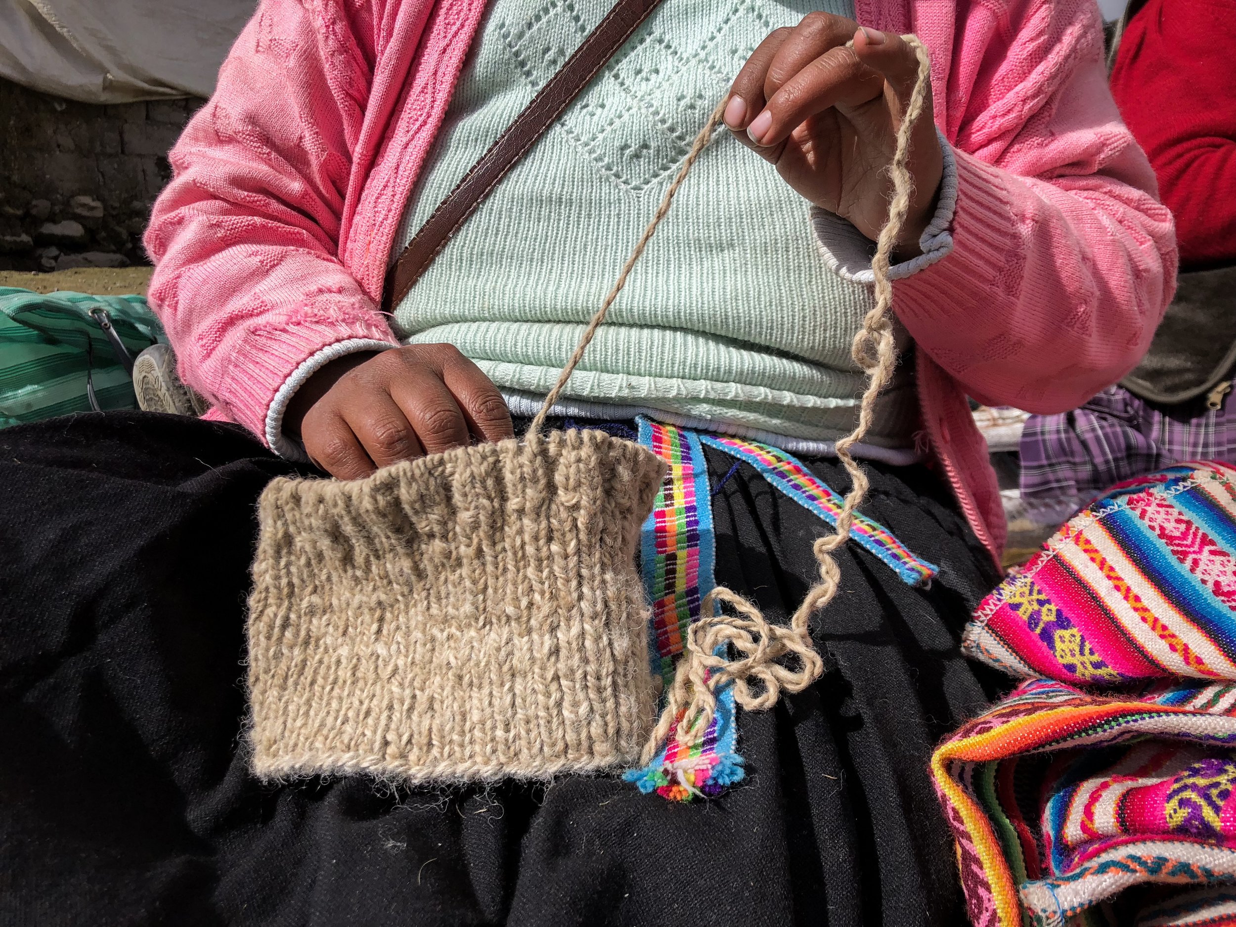 Hand spinning yarn &amp; knitting takes hours, and is a daily routine for artisans in the Andes.