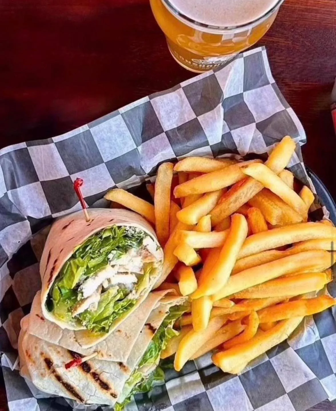 Lunch plans? It&rsquo;s a Wrap! 🌯 This chicken Caesar wrap, crispy fries, and a cold beer are calling your name. Stop by KOP and treat yourself! 🍺🍴