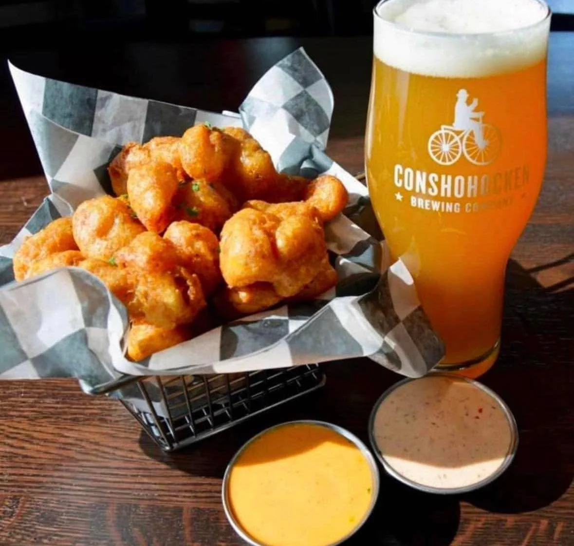 We can&rsquo;t do much about the gloomy weather, but we can hand you a basket of cheese curds and a cold beer 🙌🍻
