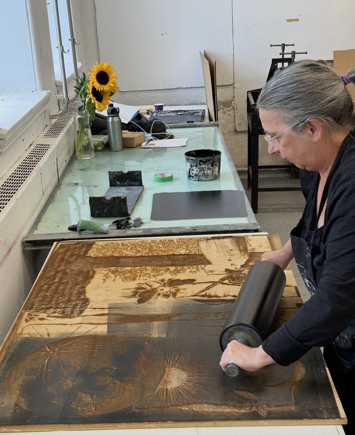  Anita rolling up the large format laser engraved block 