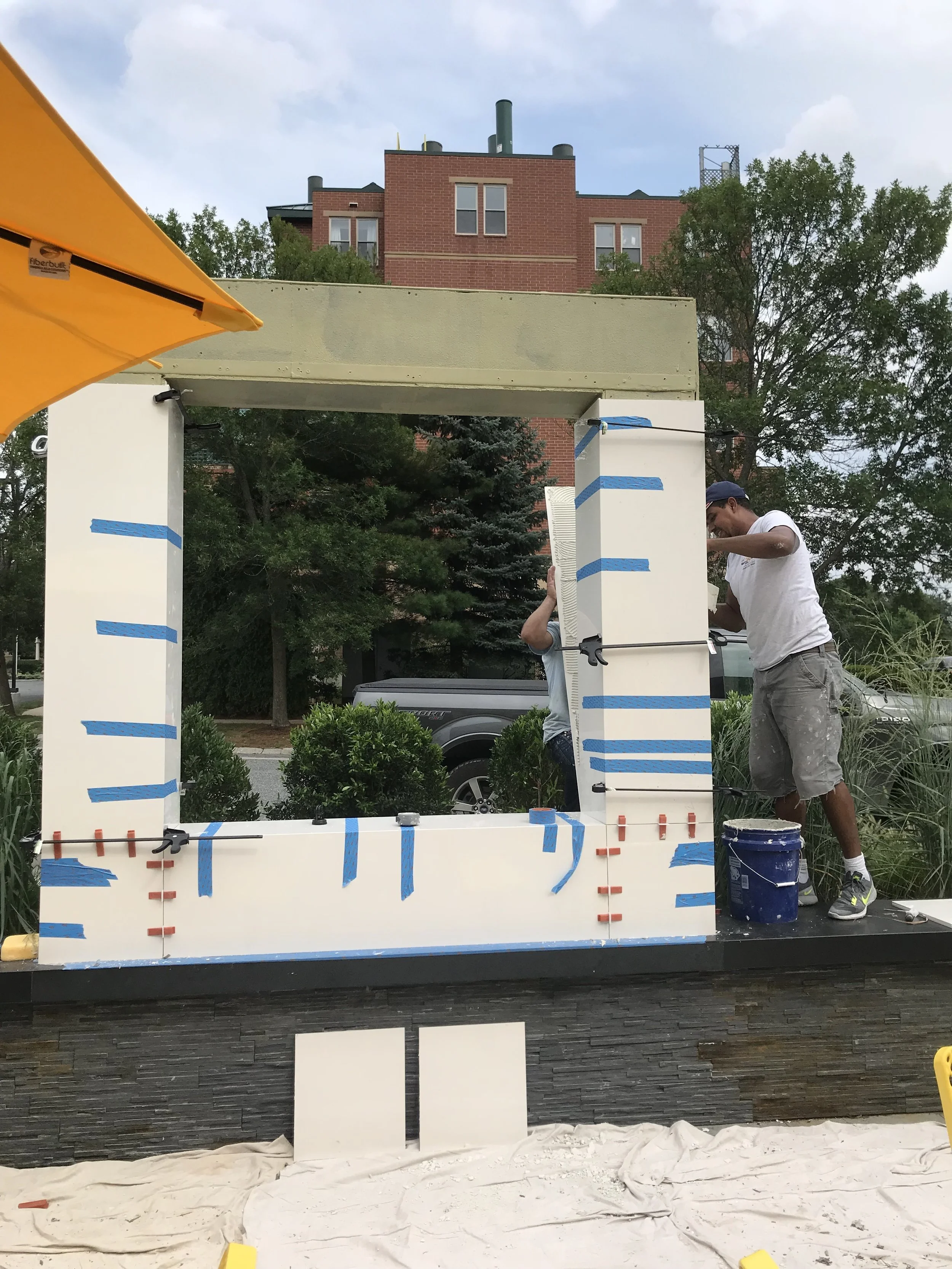 Check out this team hard at work installing this custom Dekton Panel Outdoor Sign. This piece is the final touch to a very large indoor/outdoor job that we took on and completed using high end Cosentino products. Looking good guys! 