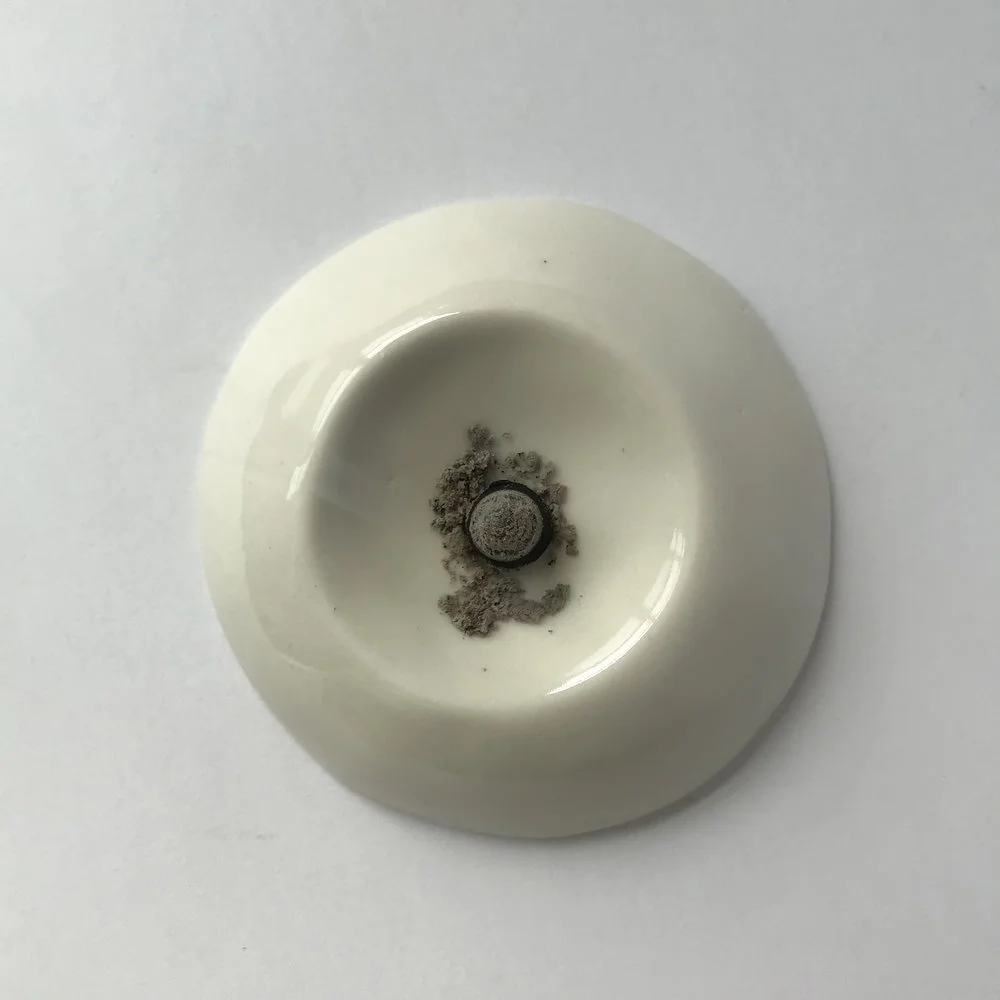 CRATER INCENSE BURNER in milk slip cast porcelain dish approx. 4" in diameter and 1" tall $15 Wholesale | $30 Retail