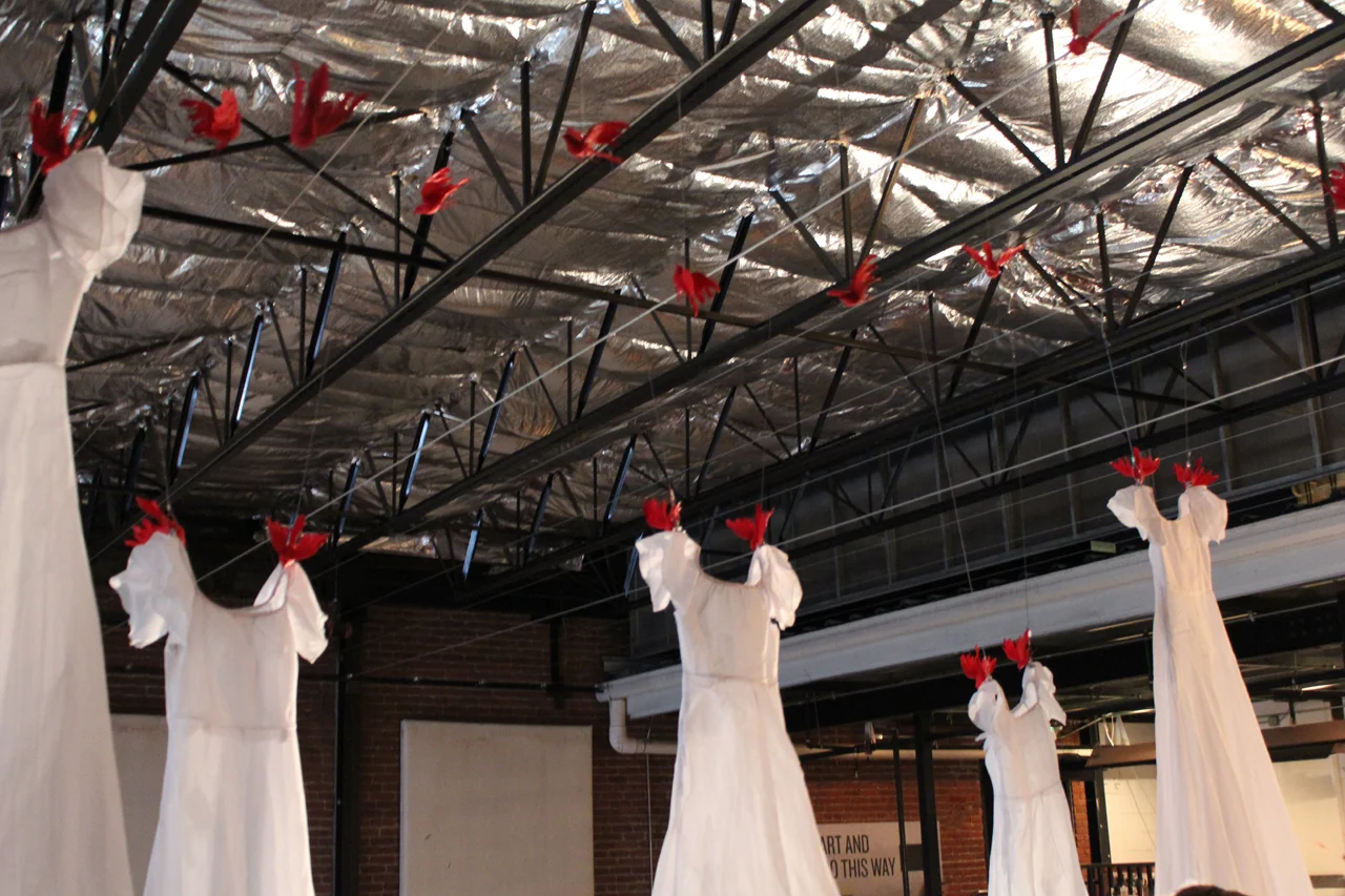 DRESSES AND CLOTHES AS DECOR, shown top of Artopia Installation_ laura phelps rogers.jpg