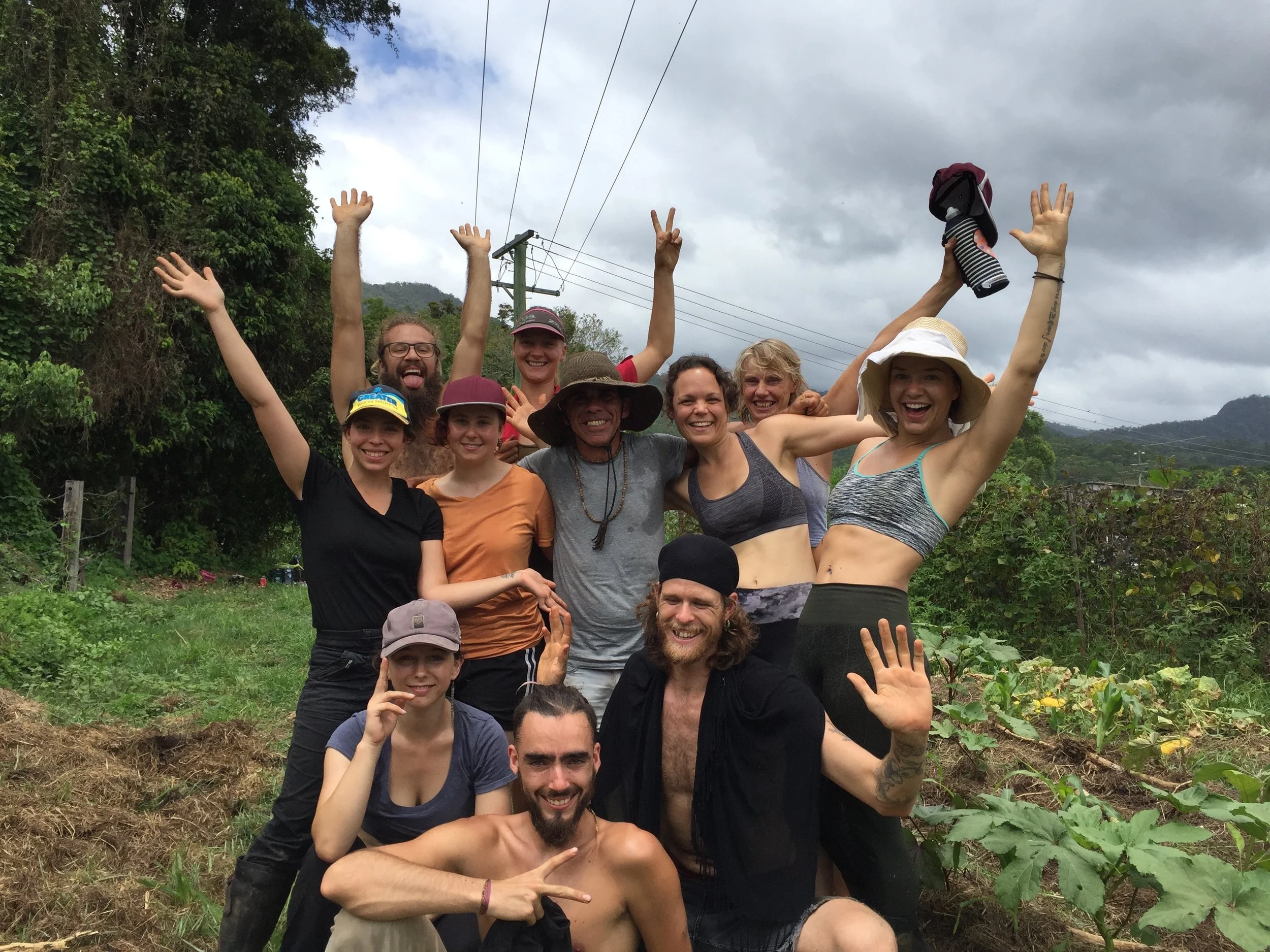 The yoga teacher trainee team with Krishna Village gardener Param