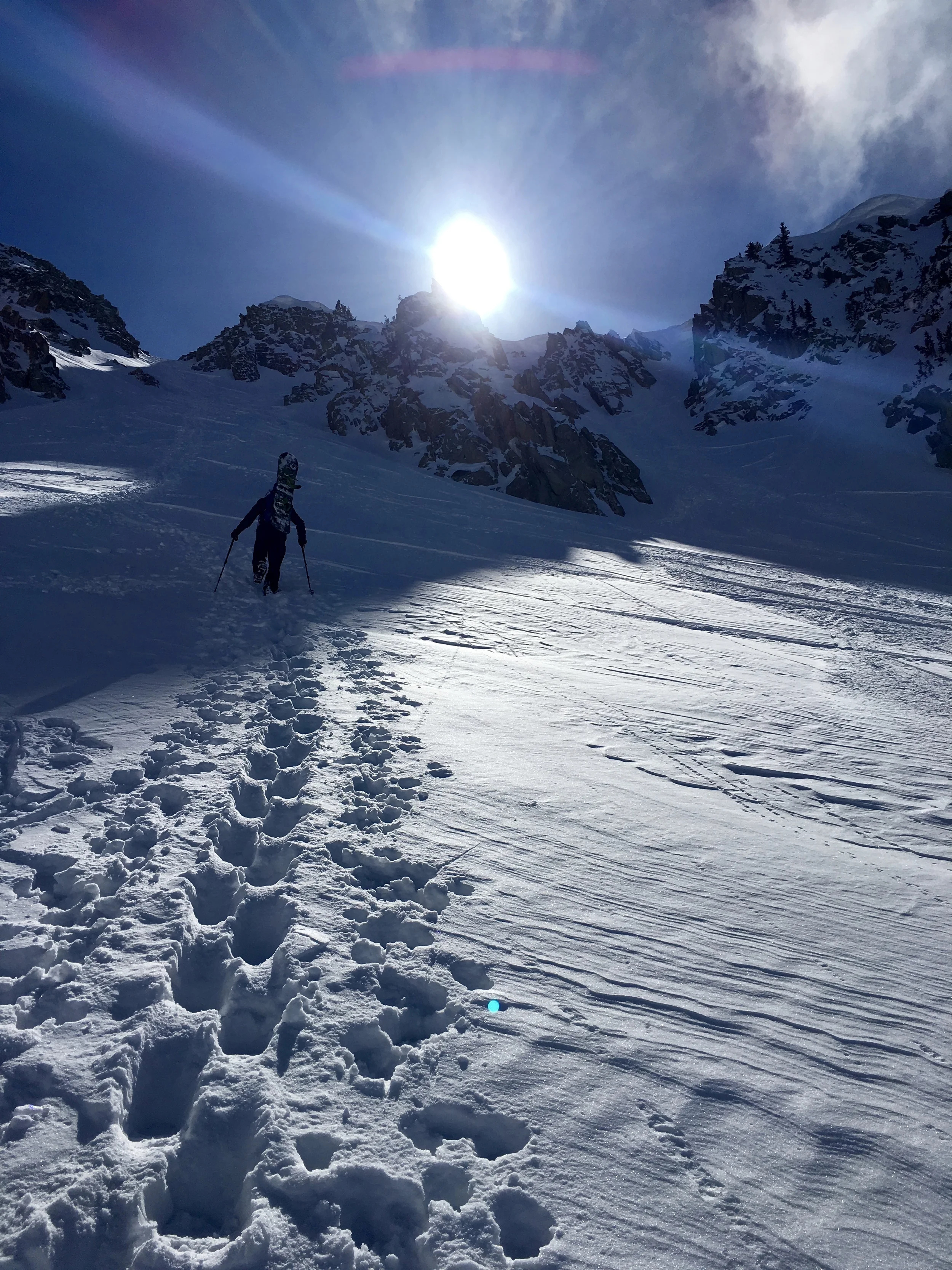 Photo: Zach Hused boot pack setting up after three laps in Wolverine Cirque Little Cottonwood Canyon, UT