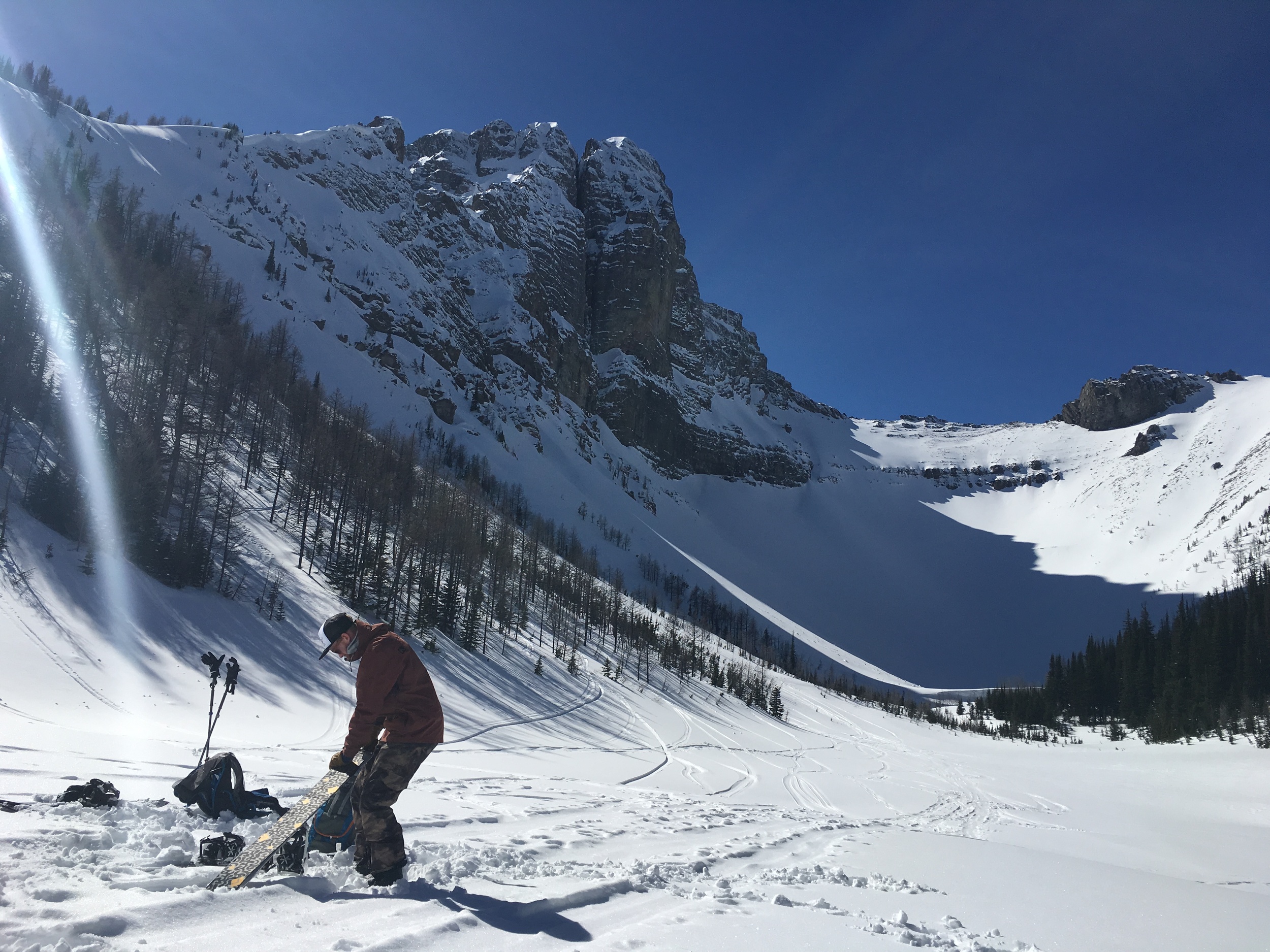 Laying the skins back down on Tryst Lake Kananaskis Country Photo: Zach