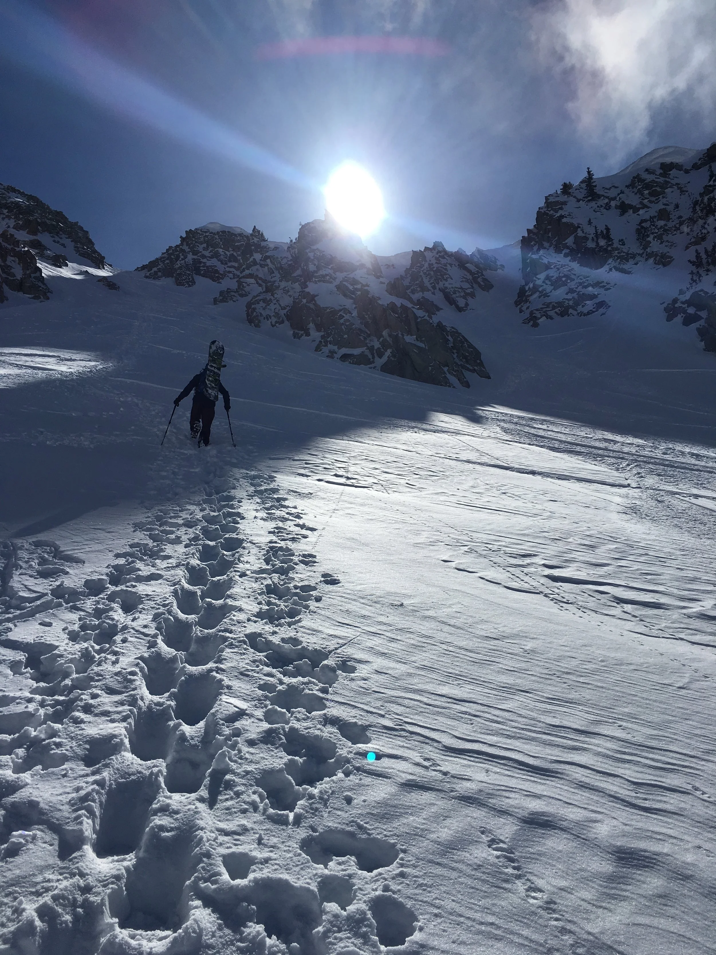 Photo: Zach Hused boot pack setting up after three laps in Wolverine Cirque Little Cottonwood Canyon, UT