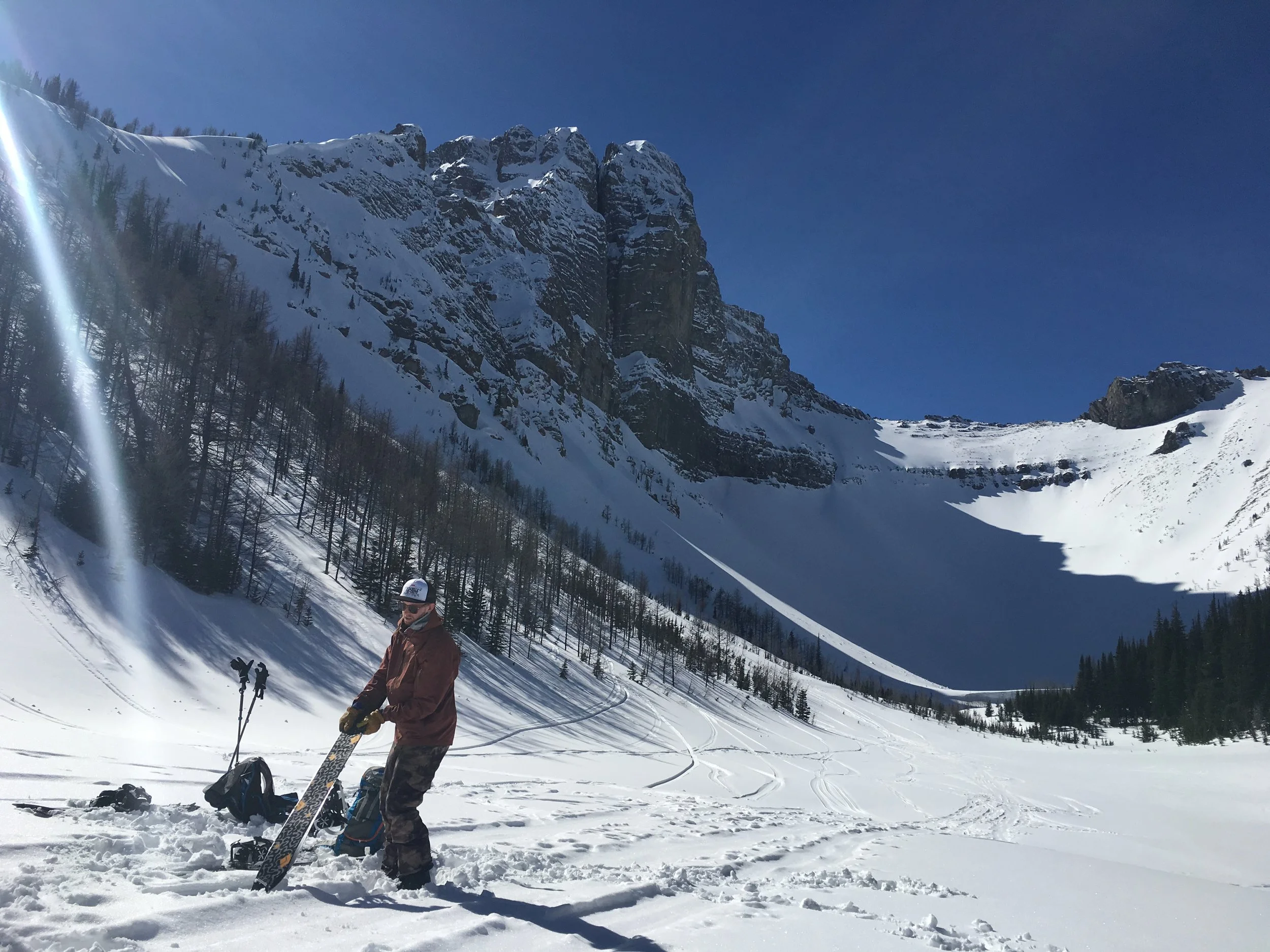 Laying the skins back down on Tryst Lake Kananaskis Country Photo: Zach