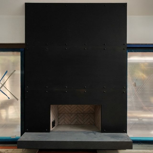 Final install day of our custom blackened steel wood burning fireplace. Full design and build from our team at LifeTimeDesign. Client: Caufield, West Vancouver, BC.  #customdesign #custombuilt #fabrication #vancouver #metalwork