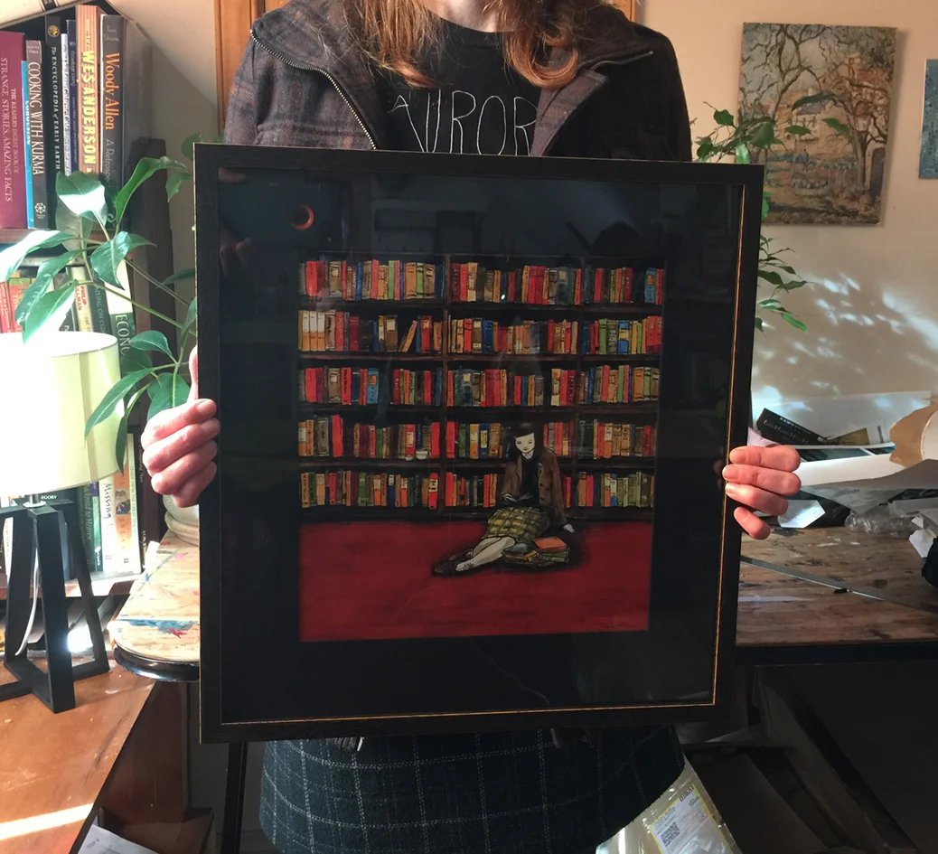 small_library_A3_framed_held by artist.jpg