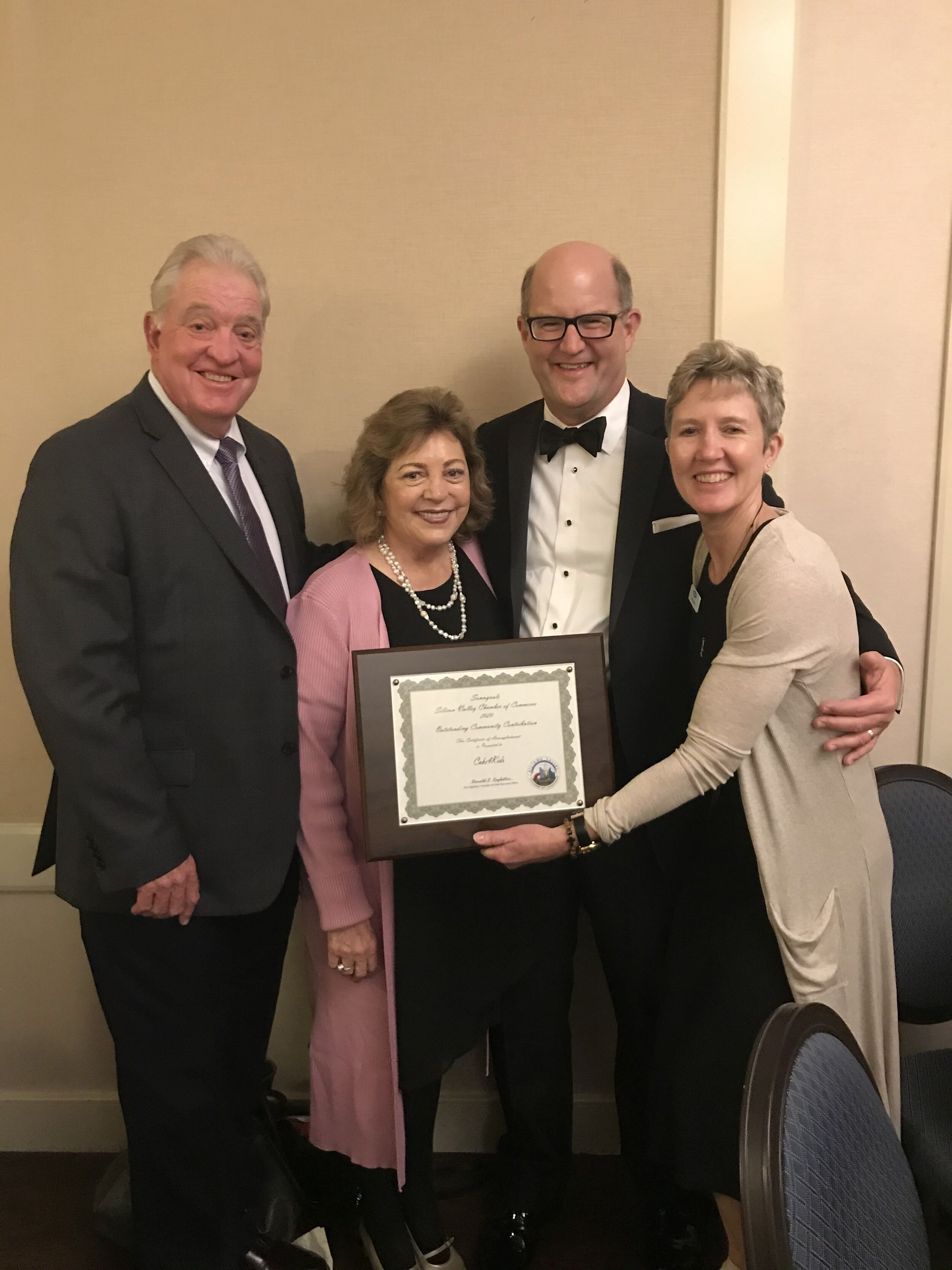  (Left to right) Keith Paulson, Claire Campodonico (Cake4Kids Volunteer), Russ Melton (Councilmember), and Julie Eades (Cake4Kids Executive Director) at the 55th Annual Murphy Awards Dinner on February 22, 2020 in Sunnyvale, CA 