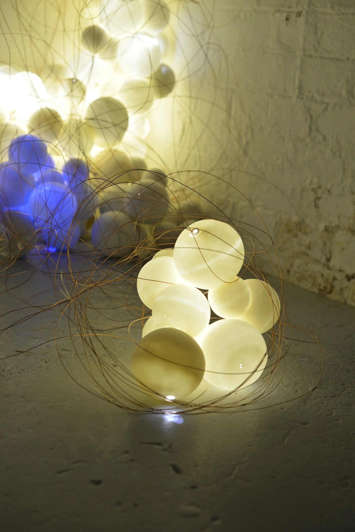 Intertwined_Dimension Variable_ Porcelain, LED lights, Wires_Leana Kim.jpg