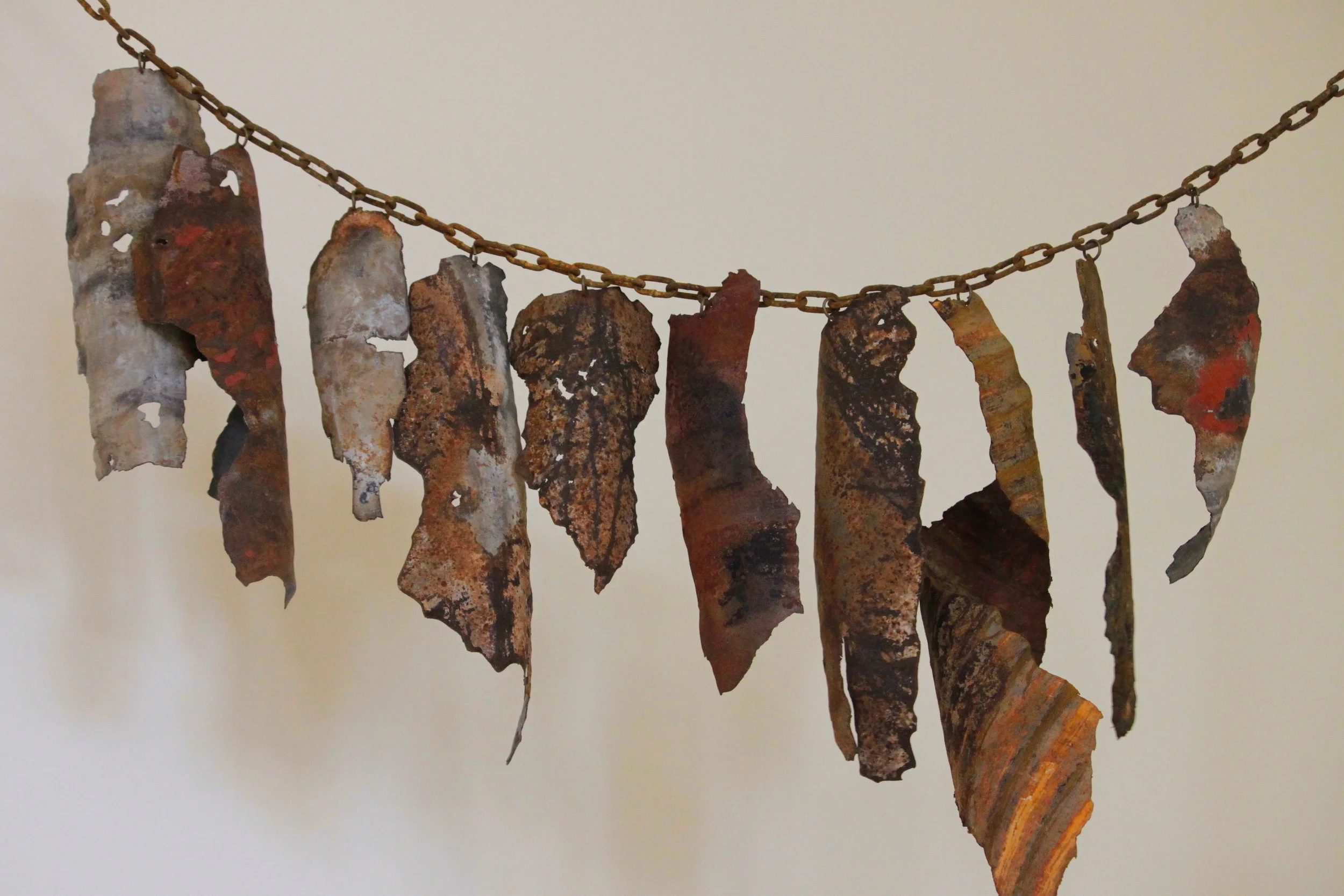 Liz Walker, Listen Up, 2018, Recycled roofing iron, steel chain, dimensions variable