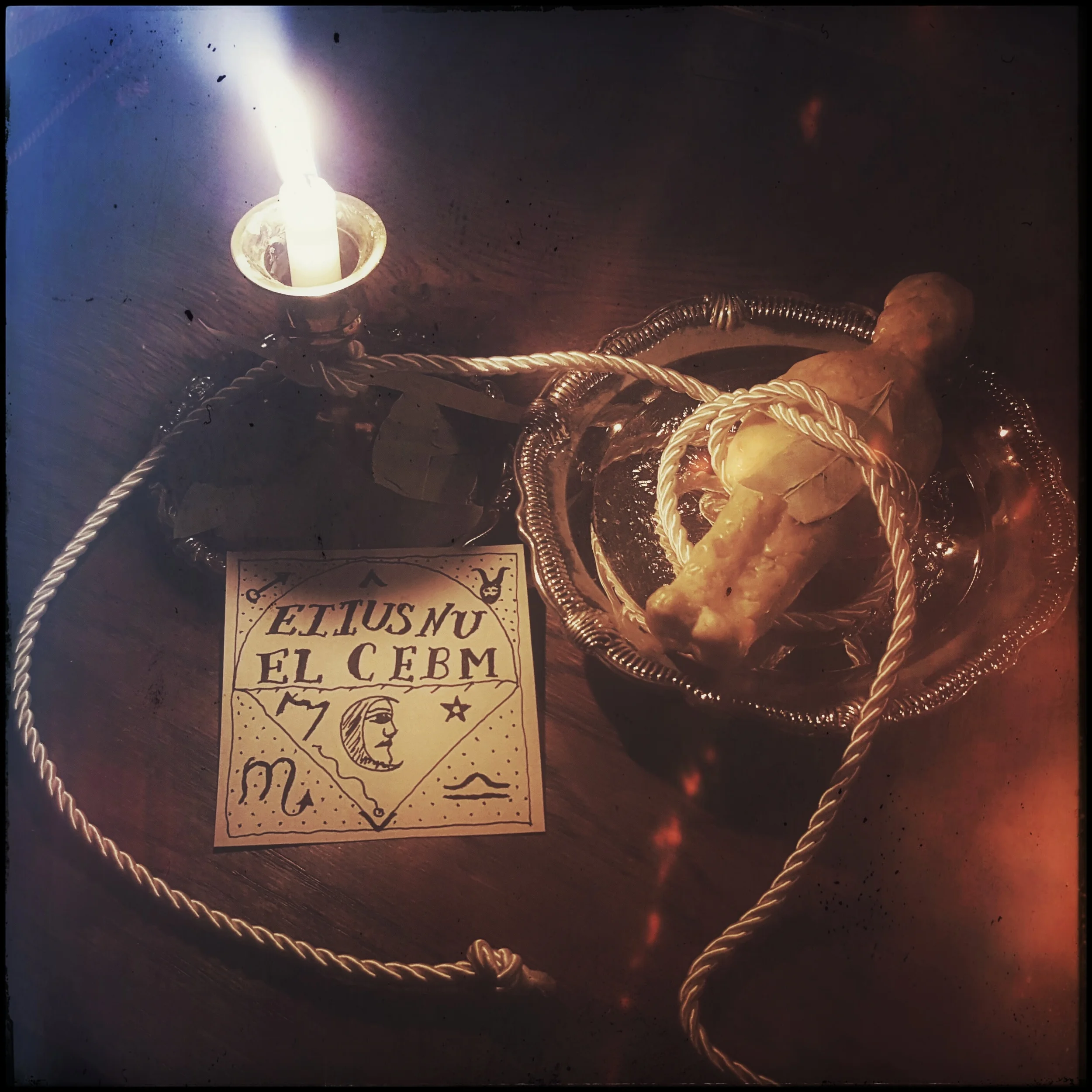 Beeswax effigy of a distant person.