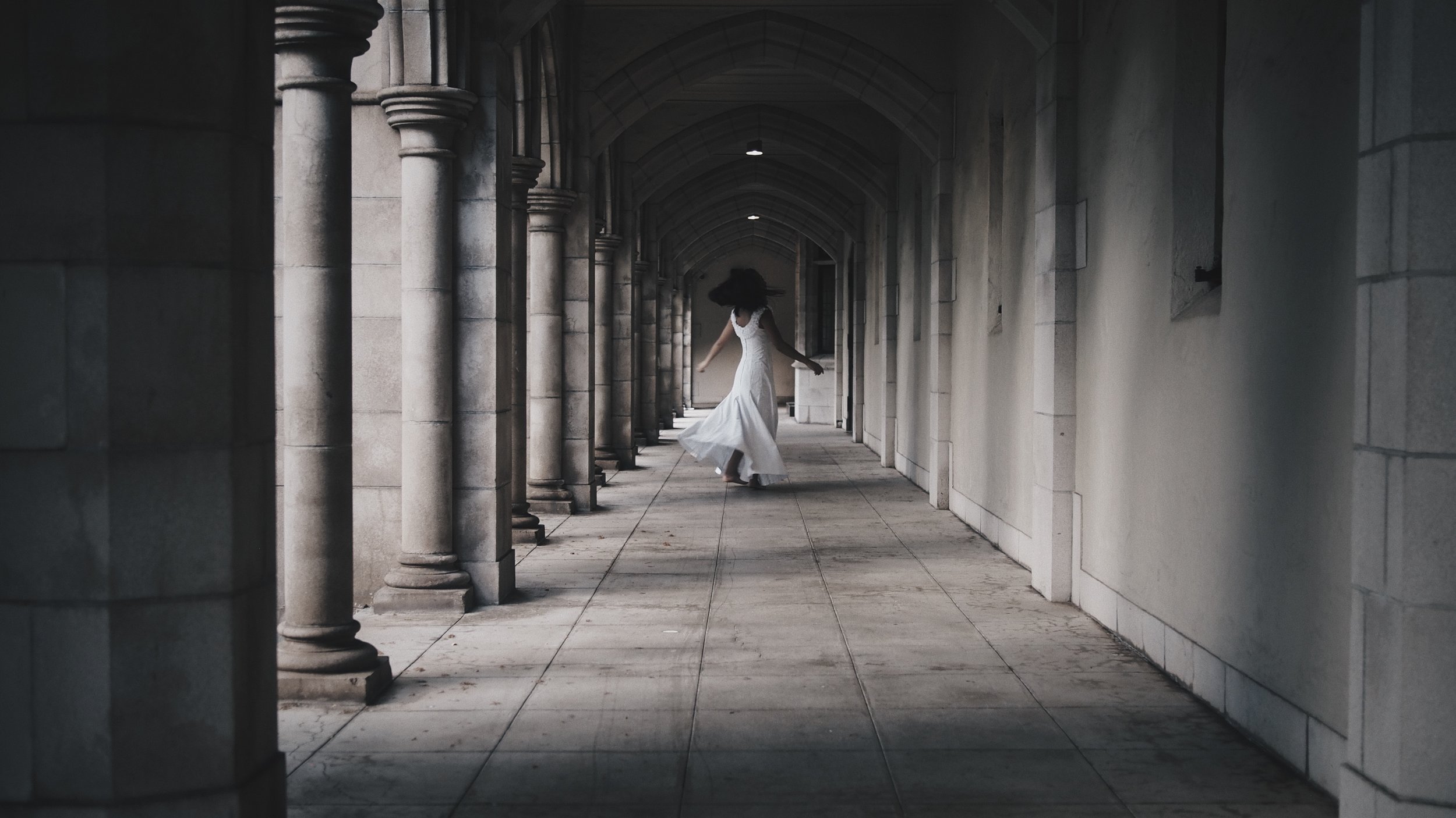 An eerie, ghostly image of a girl in a white dress