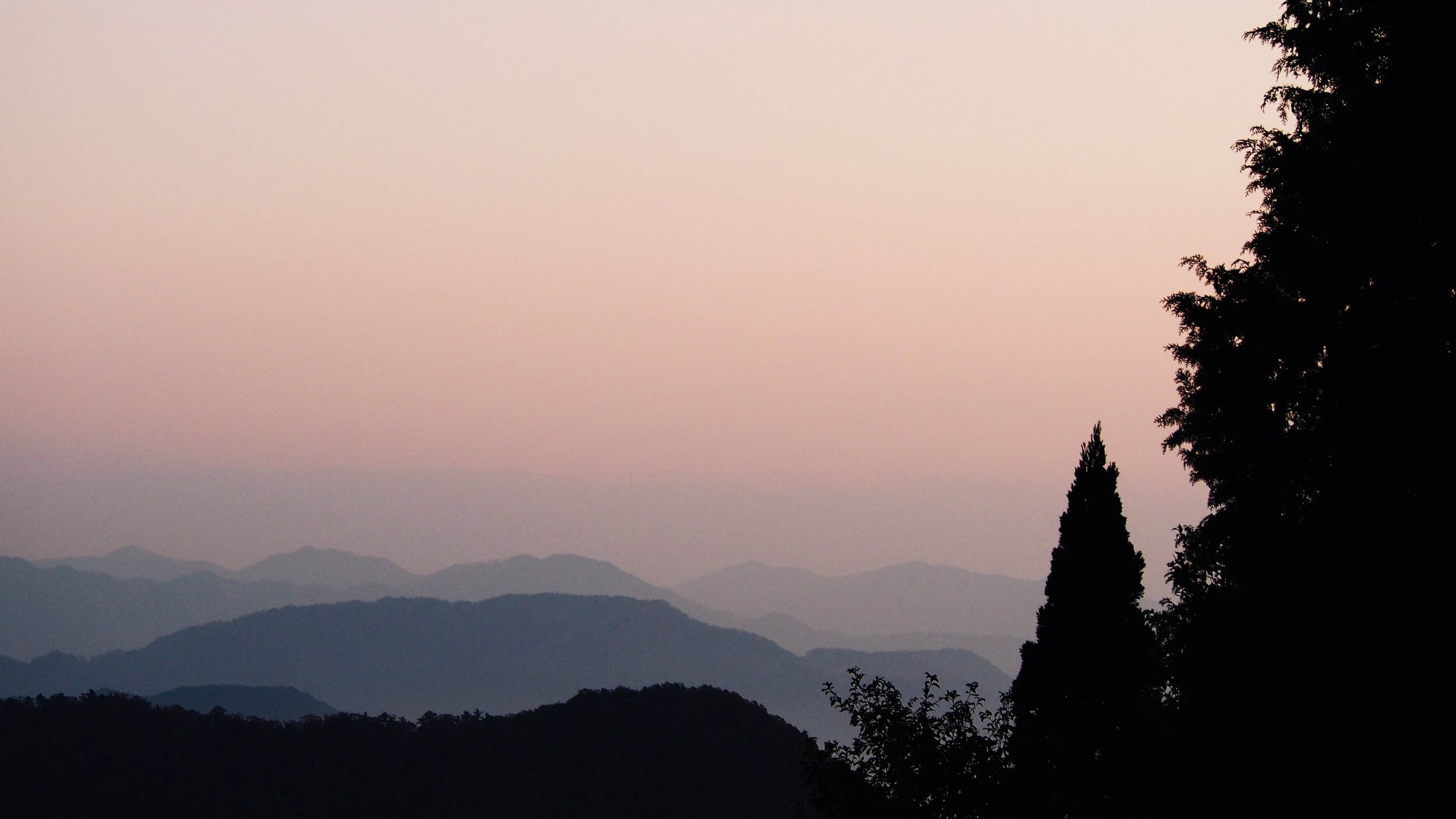 Mountains in the distance in the early morning sunrise light