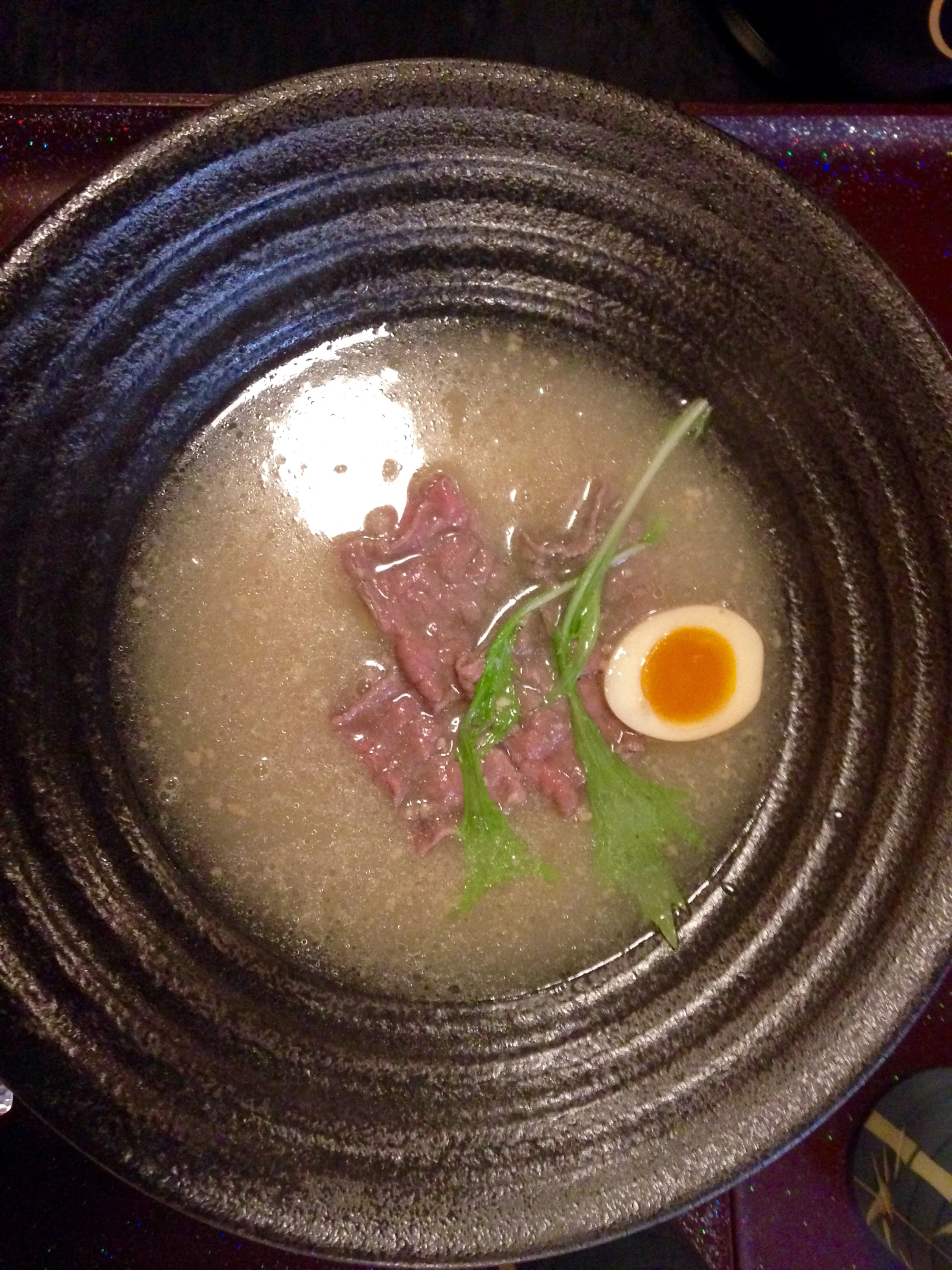 Kobe beef cooking in ramen broth.