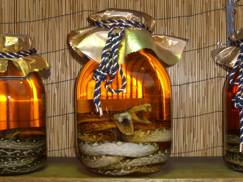 I've never tried it, but this is the stuff you can't import. It's called awamori . Photo from https://fluffykat.wordpress.com