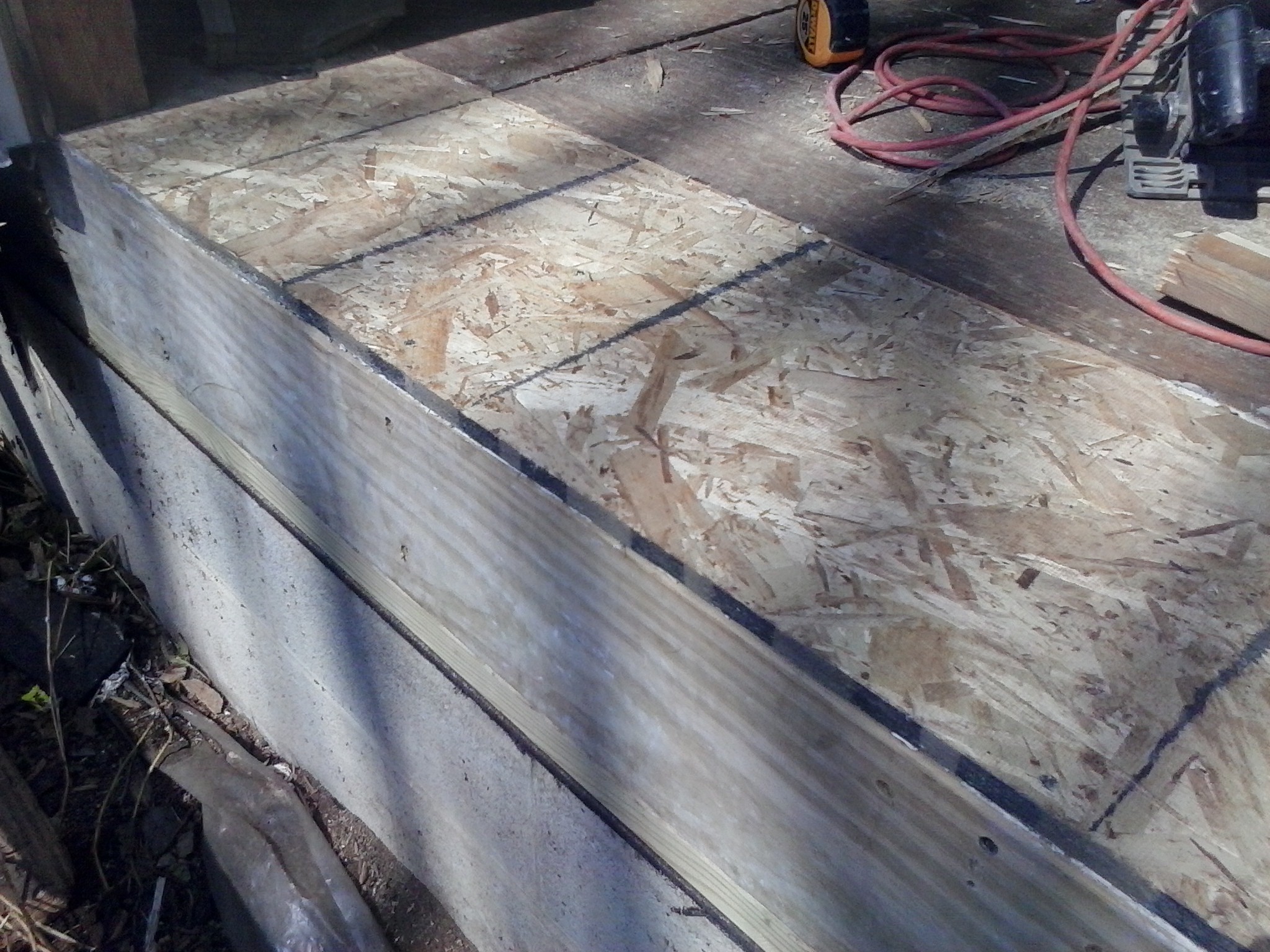 New subfloor and rim joist in place.