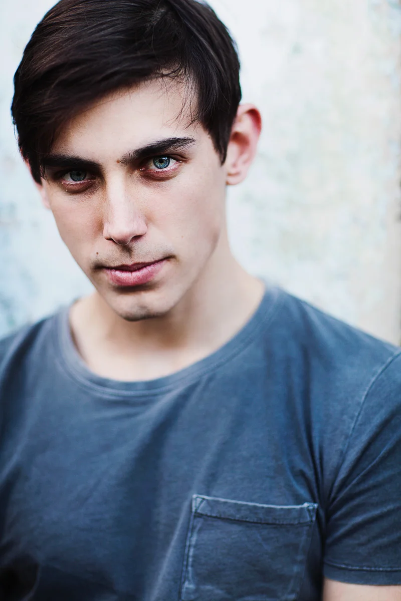 Brisbane Model Photographer Stacey Russell || Professional Australia Fashion Photography Modelling Photoshoot || Model portfolio headshot of male dark hair and blue shirt (Copy)