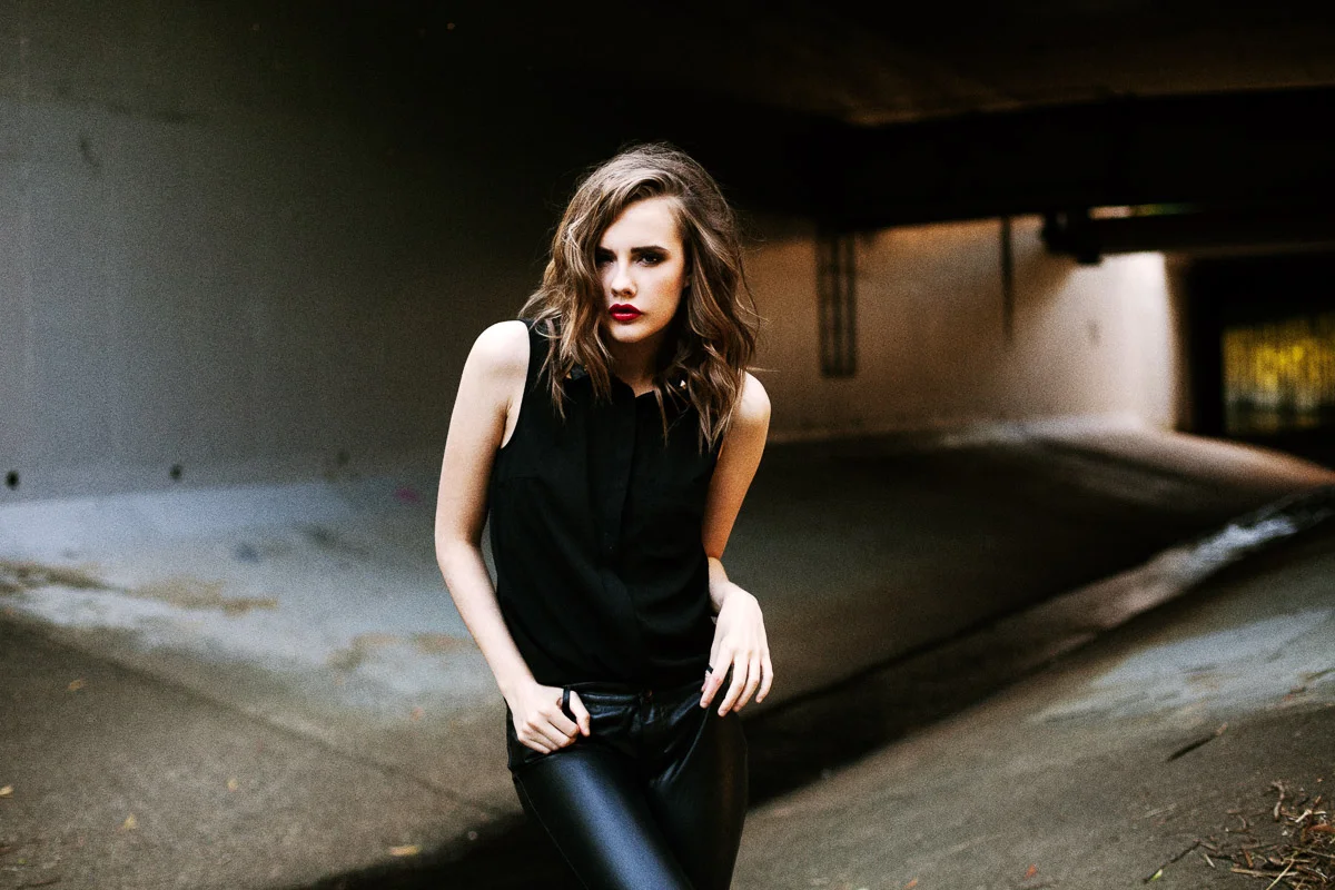 Brisbane Model Photographer Stacey Russell || Professional Australia Fashion Photography Modelling Photoshoot || Model portfolio image of girl wearing black near storm water drain (Copy)