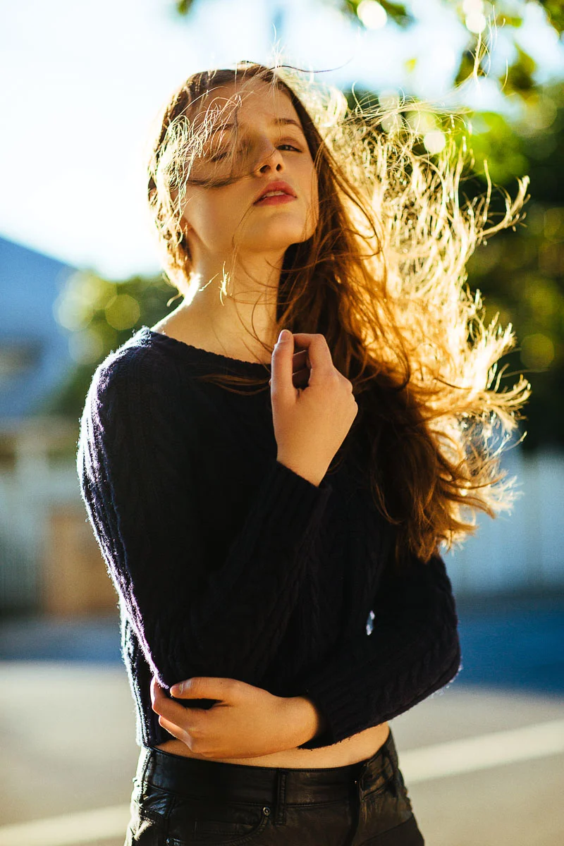 Brisbane Model Photographer Stacey Russell || Professional Australia Fashion Photography Modelling Photoshoot || Model portfolio headshot of girl in blue jumper wind blowing hair (Copy)