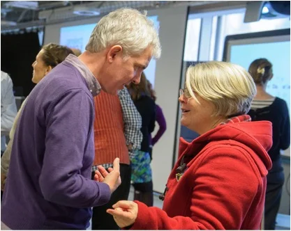 Sue Mayo in deep discussion with Adam Annand, Associate Director of Creative Learning at the London Bubble Theatre Company