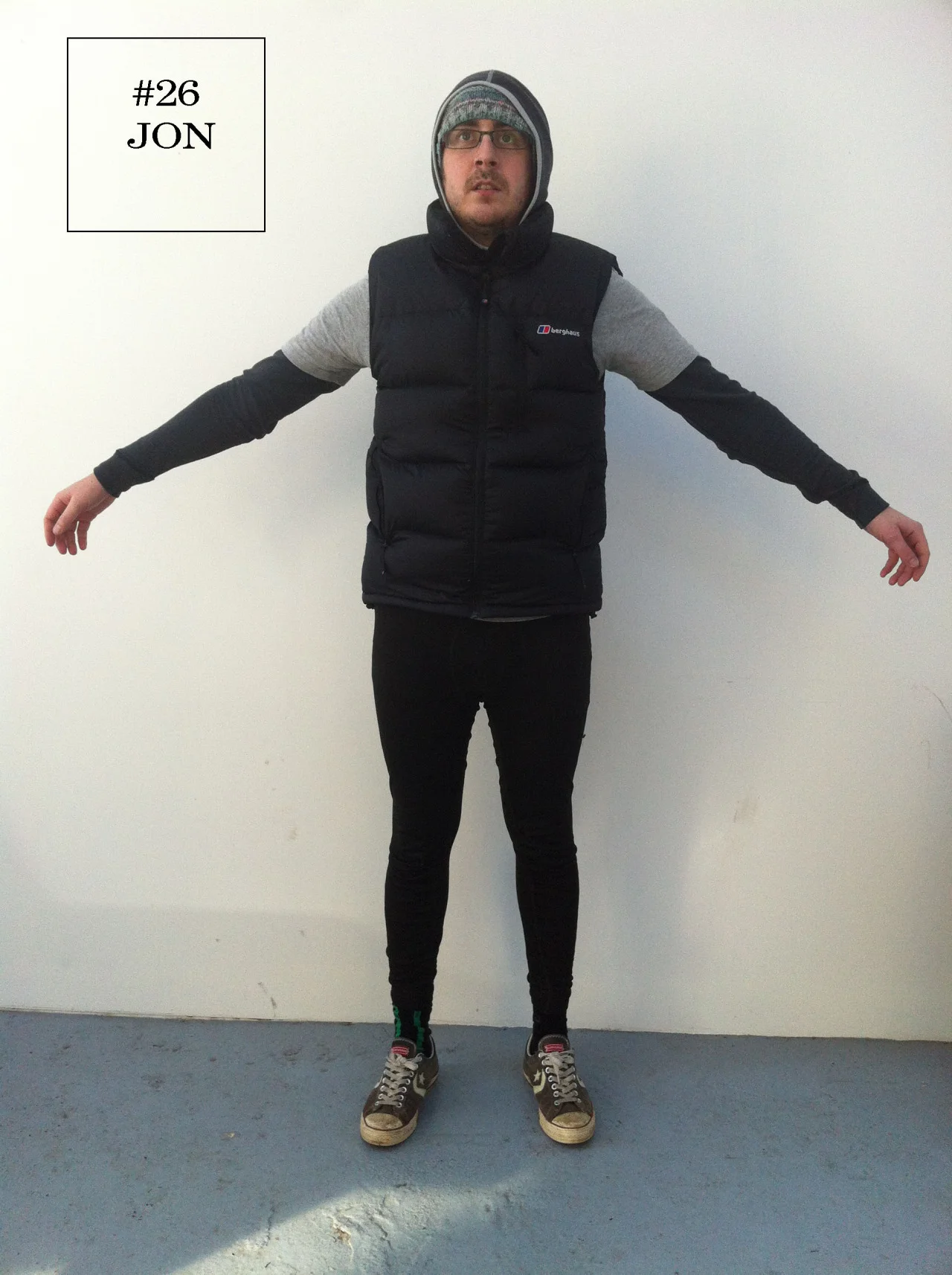 With snow on the way Jon decided that there was only one way to dress; extreme layering.
J W Anderson’s menswear show last week may have given us men in skirts but Jon’s interpretation of the androgynous trend is a little more practical. Tights under his jeans keep him toasty whilst an amalgamation of knitwear and padded gillet keep the elements at bay.
Oddly enough though after all that care to keep himself warm he’s left his hands at risk of frost bite- A pair of gloves to go with that ensemble perhaps sir?
Layers: I literally don’t know where to begin…
