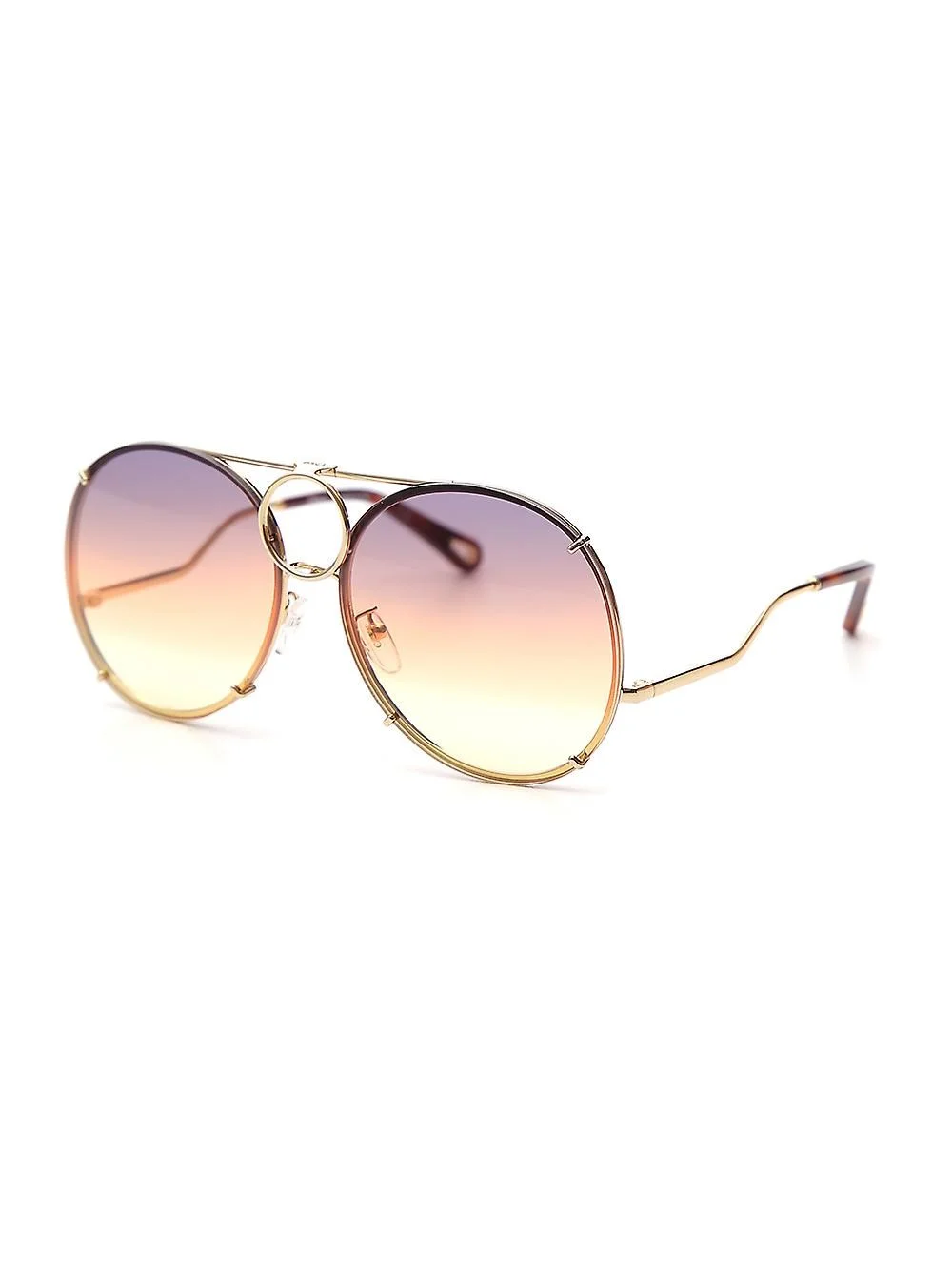 Vicky Sunglasses £325, Eyesite Opticians