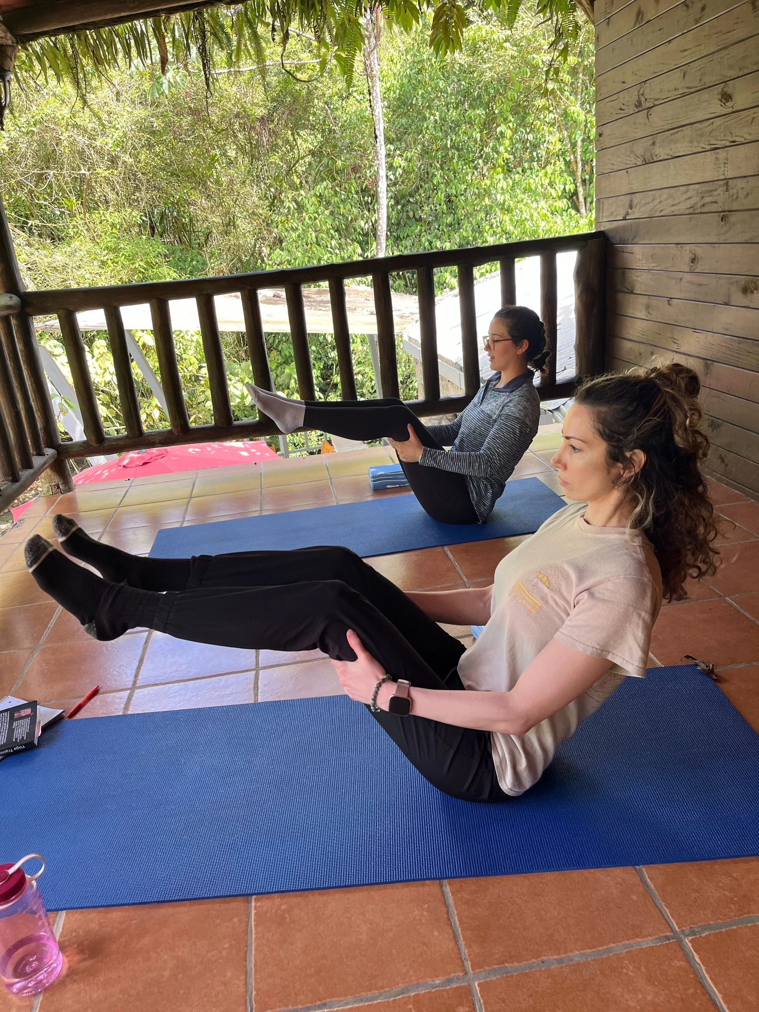 Practicing the boat pose