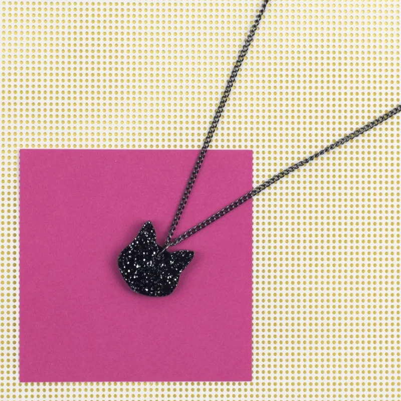 How about a teeny-tiny, purrfect Midnight Kitty pendant ? 📷 Holly Booth Photography