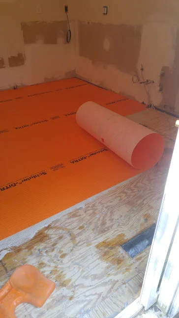 Ditra takes the place of cement board on flooring jobs in our world. We use ditra when we're putting tile on plywood. Cement board for this application is antiquated.