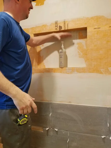 Notice this inset box. 100% waterproof with a kerdi fabric flange. From what we see in the field, very few people are building waterproof soap niches. We build ours custom to your specifications. How would you like to be able to actually pump your soap? We can build you that.