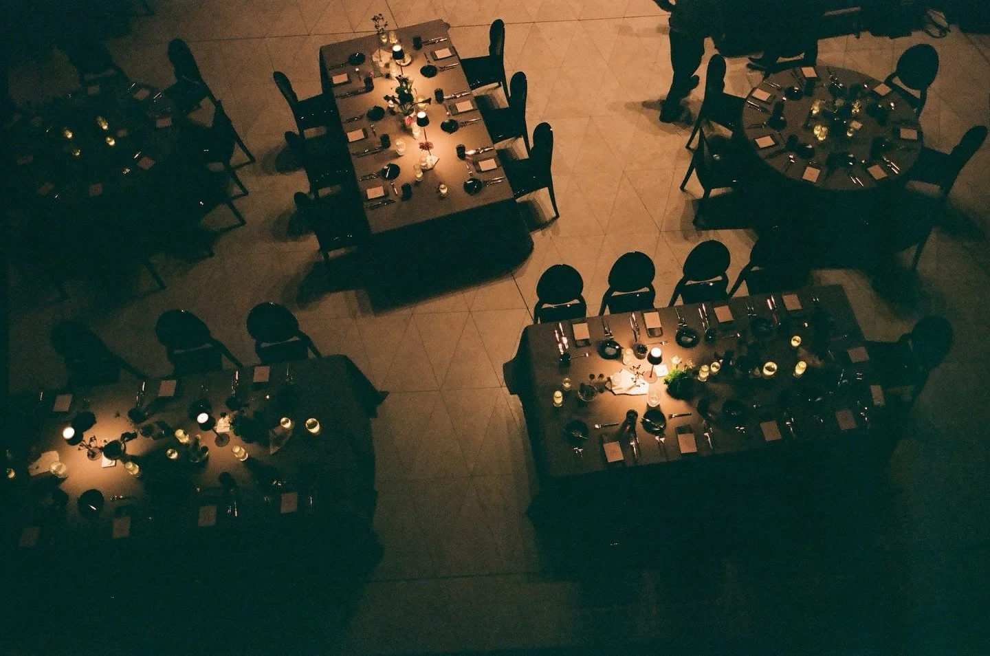 Investing in an art-forward experience, not just &lsquo;flowers.&rsquo; We compose every layer of your tablescape (way beyond the floral) to ensure the design is as unforgettable as the conversation. Moody gallery vibes, meticulously composed.&nbsp;
