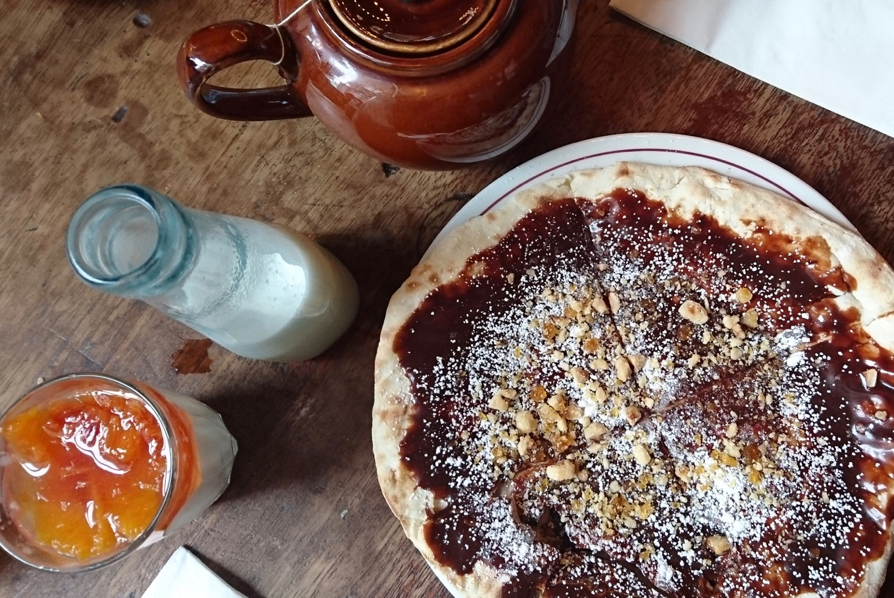 Peach Panacotta accompanied by my all-time-fave, the Nutella Pizzetta at Polpo's Soho branch in London -&nbsp;&nbsp;a delightfully chocolatey but not-too-heavy desert!