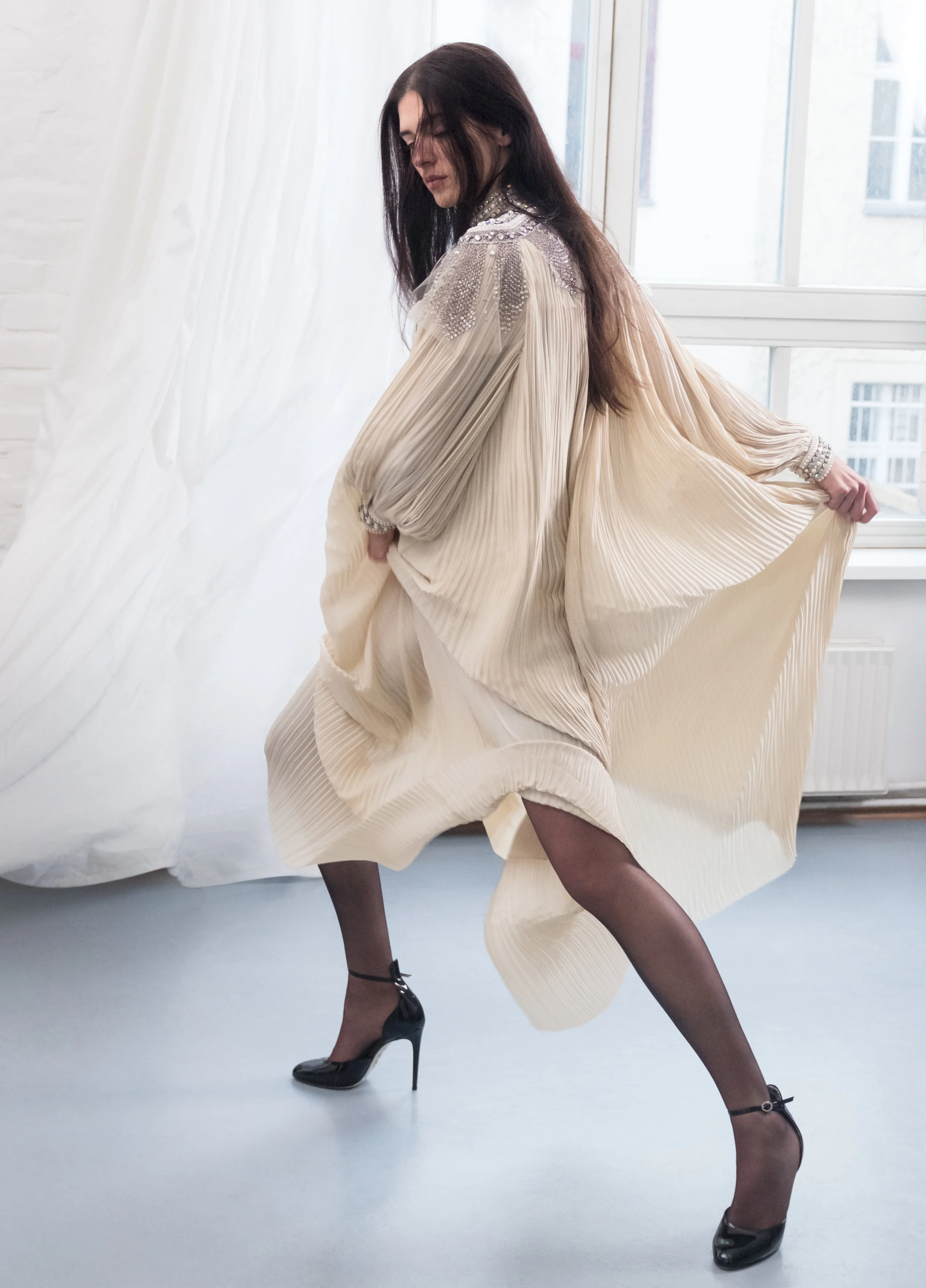 Franziska viste zapatos y vestido de GUCCI y medias de FALKE .