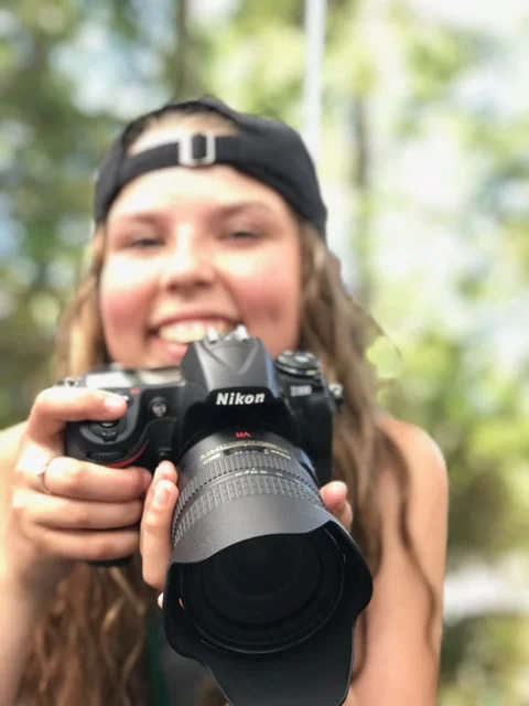 Izzy with camera.JPG