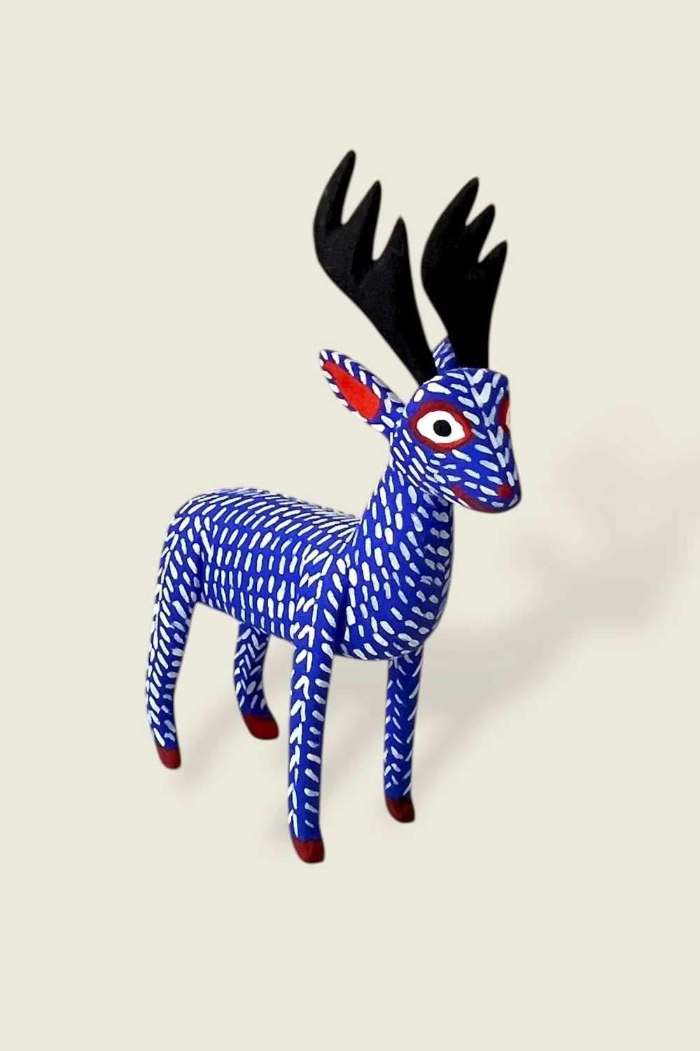 Oaxaca carved alebrije of a cobalt blue deer