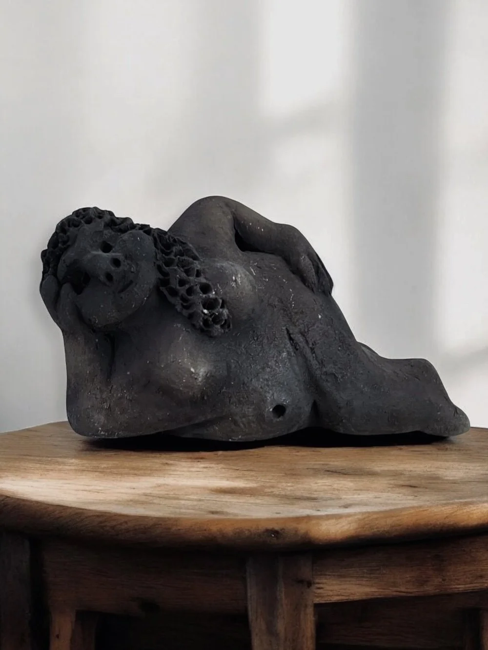 Reclining female clay sculpture made in Oaxaca