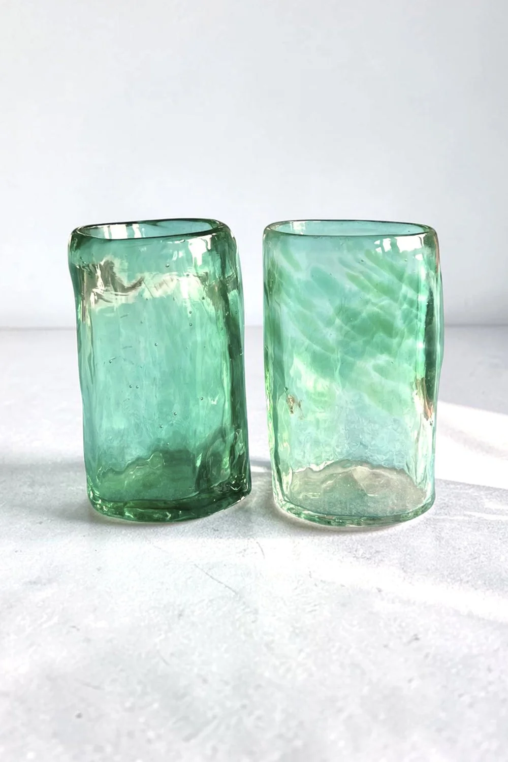 Pair of Studio Xaquixe glass shot glasses