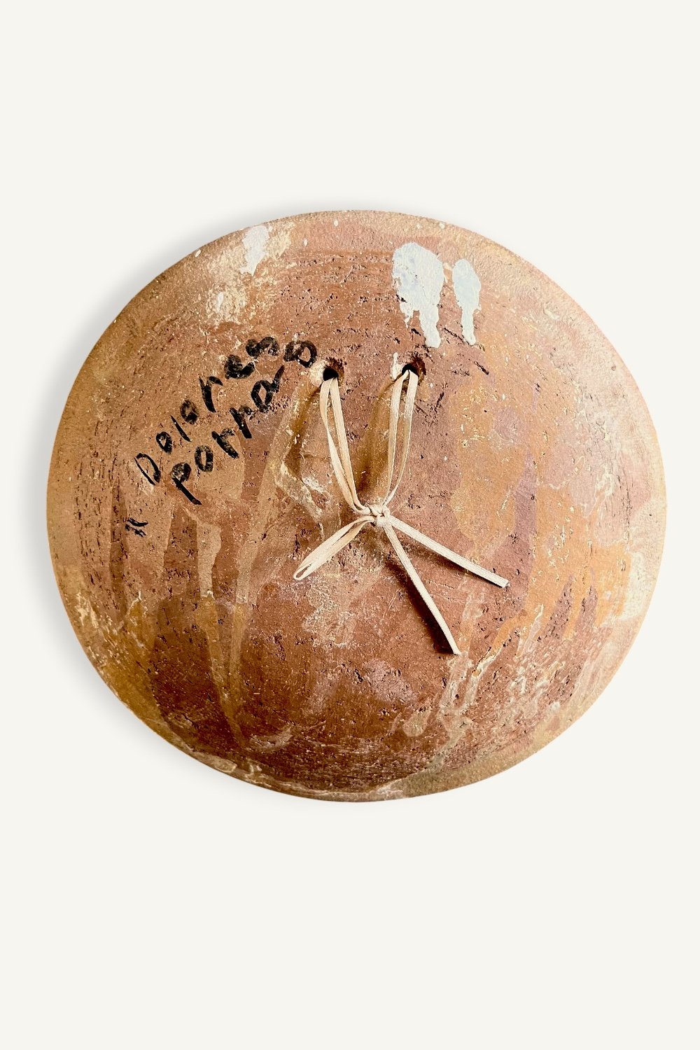 Back of Dolores Porras hanging plate
